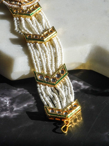 Gold moissanite polki mathapatti with ivory beading for Indian jewelry wear from Inaury