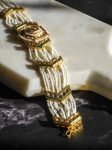 Gold moissanite polki mathapatti with ivory beading for Indian jewelry wear from Inaury