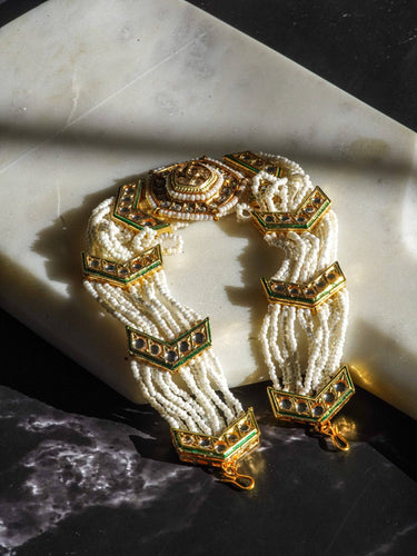 Gold moissanite polki mathapatti with ivory beading for Indian jewelry wear from Inaury