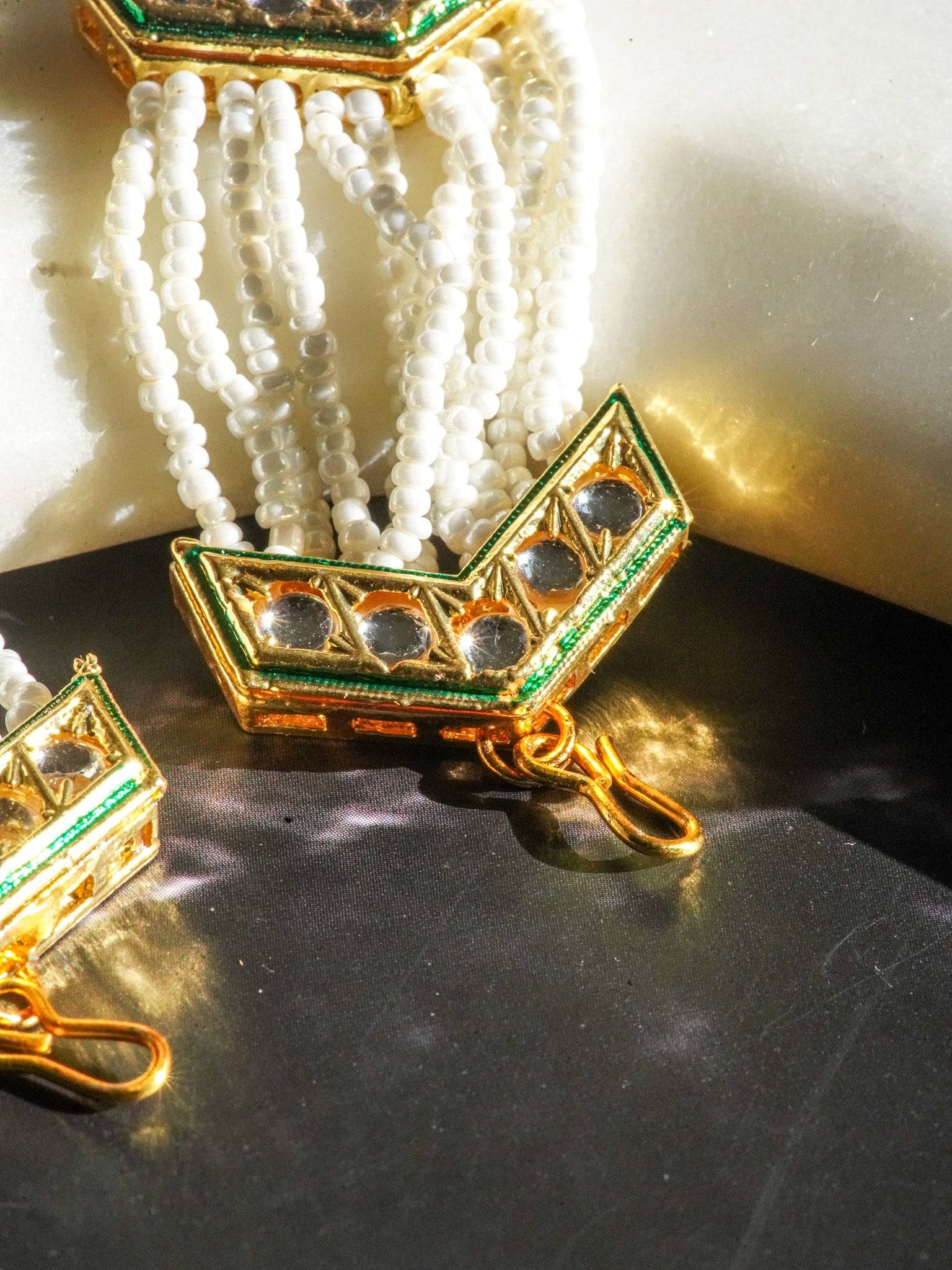 Gold moissanite polki mathapatti with ivory beading for Indian jewelry wear from Inaury