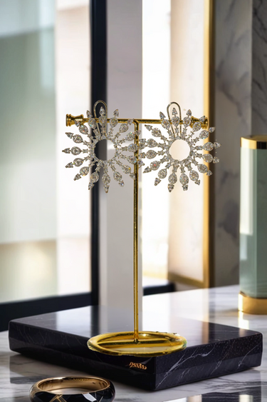 Starburst Statement Earrings with rhodium plating and pavé stones on a gold stand; 2.3-inch oversized studs with secure hook backs for elegance.
