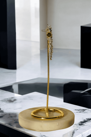 Starburst Statement Earrings with rhodium plating and pavé stones on a gold stand; 2.3-inch oversized studs with secure hook backs for elegance.