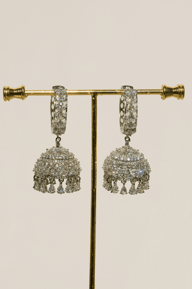 Tarin AD Diamante Jhumka Earrings displayed on a stand