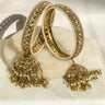 Antique mehendi gold bangle set with reverse AD stones and jhumka tassels from Inaury