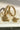 Antique mehendi gold bangle set with reverse AD stones and jhumka tassels from Inaury