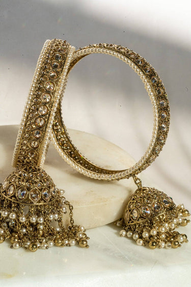Antique mehendi gold bangle set with reverse AD stones and jhumka tassels from Inaury