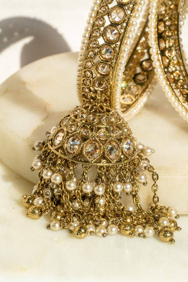 Antique mehendi gold bangle set with reverse AD stones and jhumka tassels from Inaury