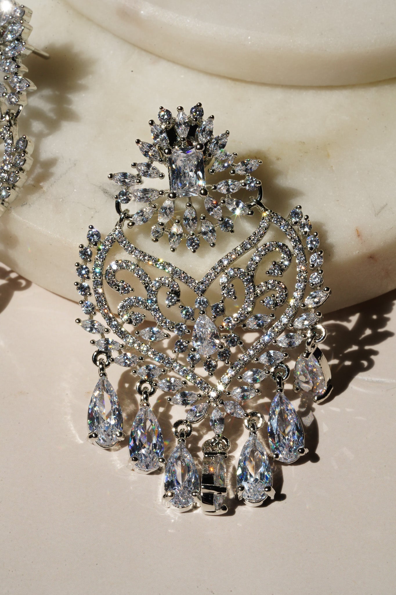 Aleena AD Chandbali Earrings - Rhodium plated with Diamante accent AD-CZ stones, 2.2 inches long, featuring a crescent moon shape, perfect for any occasion.
