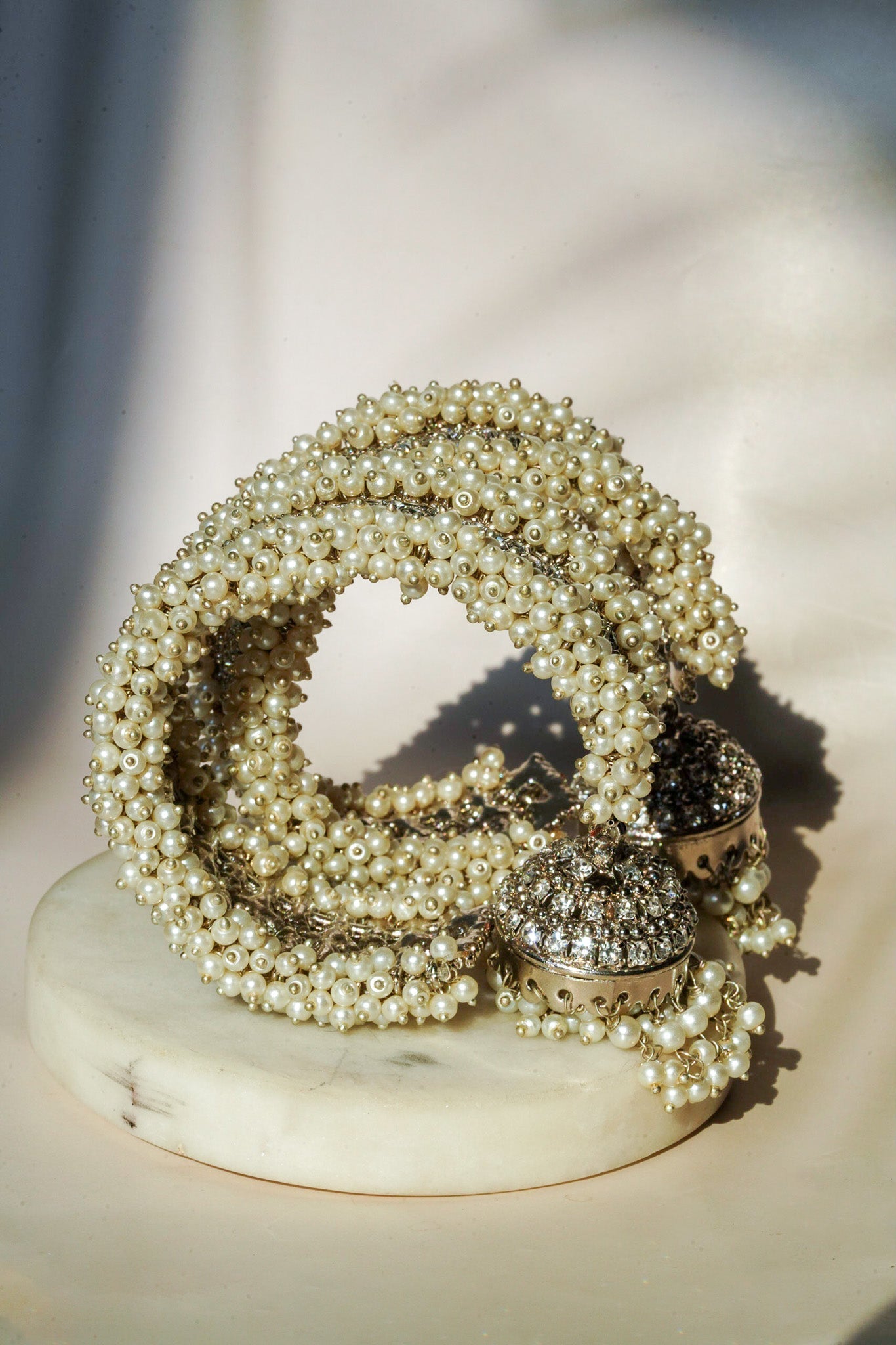 Aliya Handcrafted Bangle Bracelet - Available in silver and faux pearls, gold and faux pearls, silver and black, gold and black, gold and maroon, and silver and pink, with hanging jhumka.