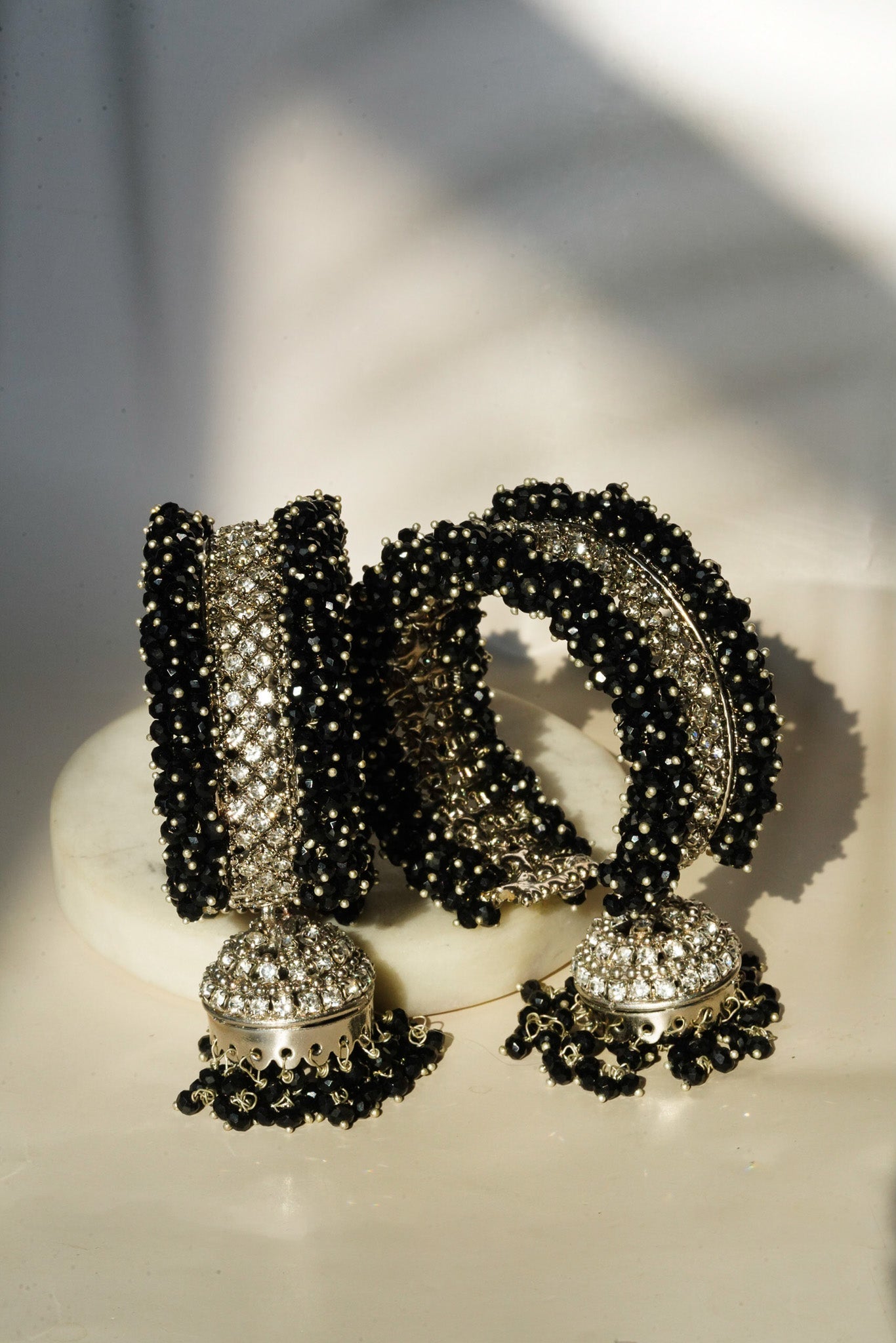 Aliya Handcrafted Bangle Bracelet - Available in silver and faux pearls, gold and faux pearls, silver and black, gold and black, gold and maroon, and silver and pink, with hanging jhumka.