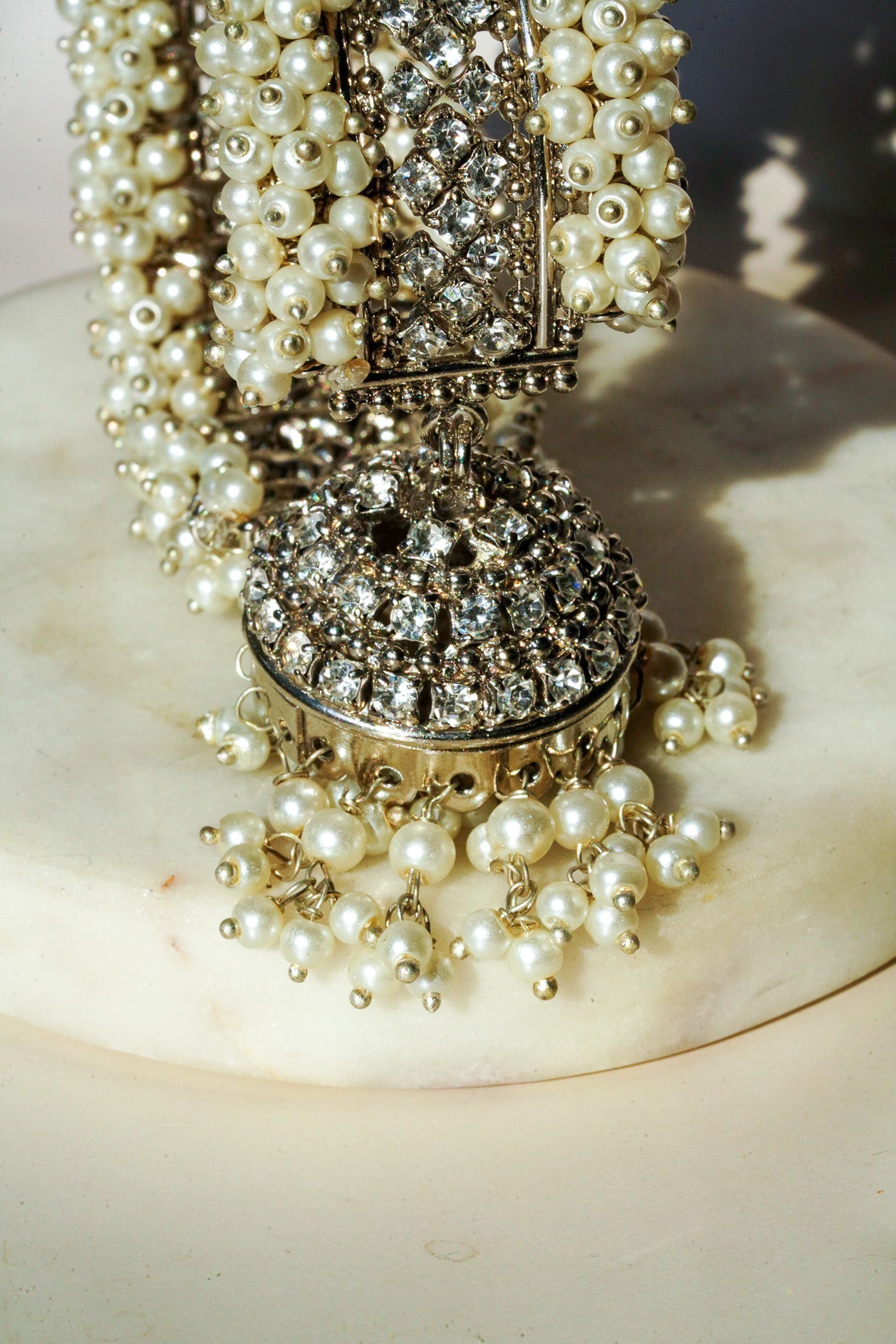 Aliya Handcrafted Bangle Bracelet - Available in silver and faux pearls, gold and faux pearls, silver and black, gold and black, gold and maroon, and silver and pink, with hanging jhumka.