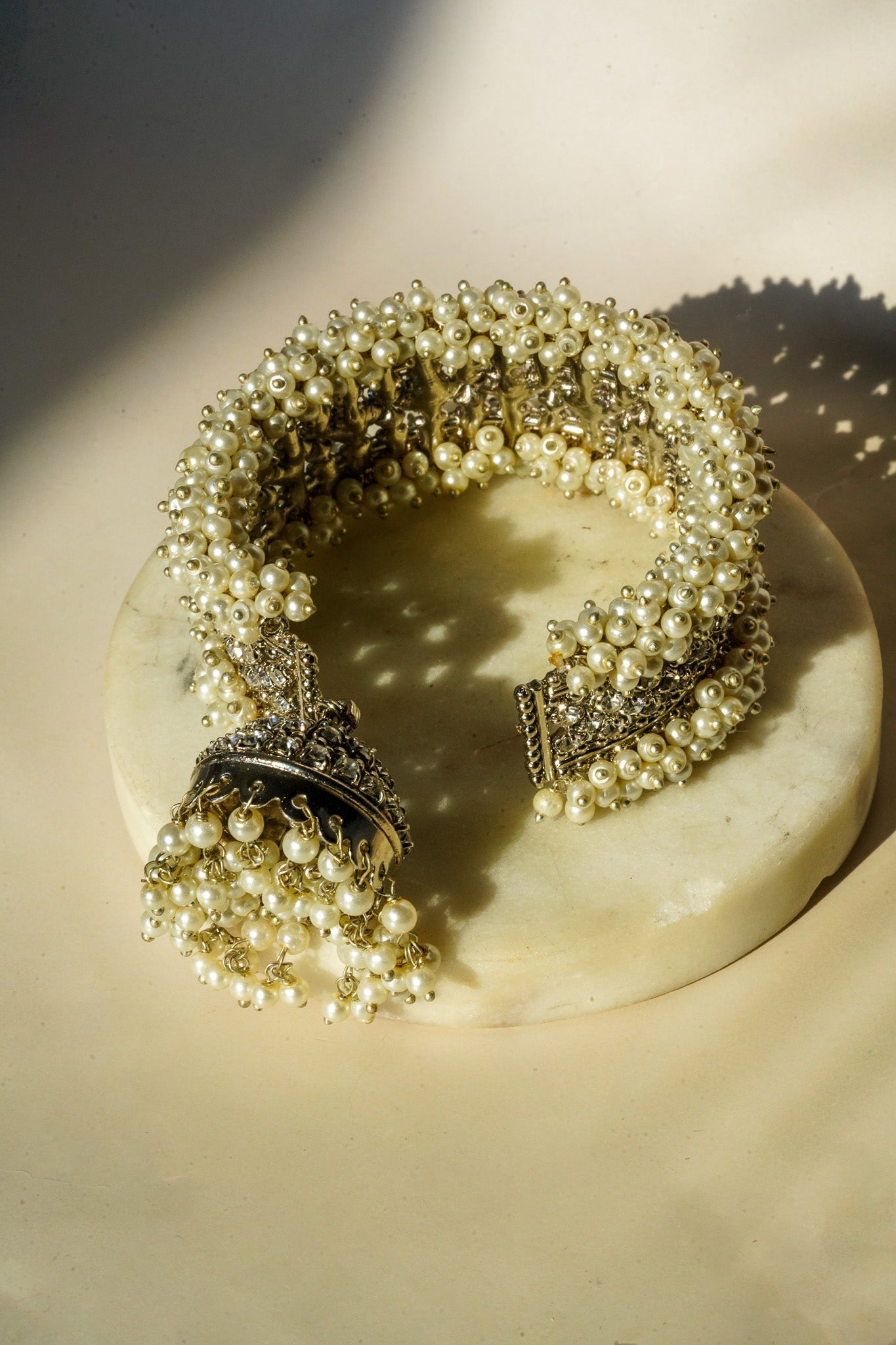 Aliya Handcrafted Bangle Bracelet - Available in silver and faux pearls, gold and faux pearls, silver and black, gold and black, gold and maroon, and silver and pink, with hanging jhumka.