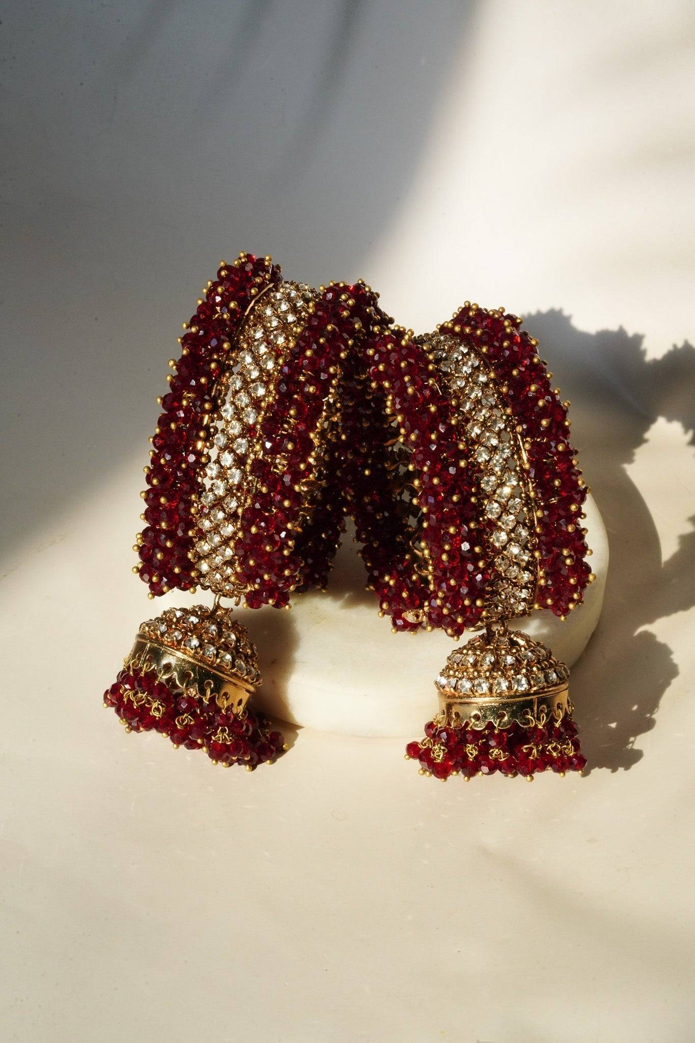 Aliya Handcrafted Bangle Bracelet - Available in silver and faux pearls, gold and faux pearls, silver and black, gold and black, gold and maroon, and silver and pink, with hanging jhumka.