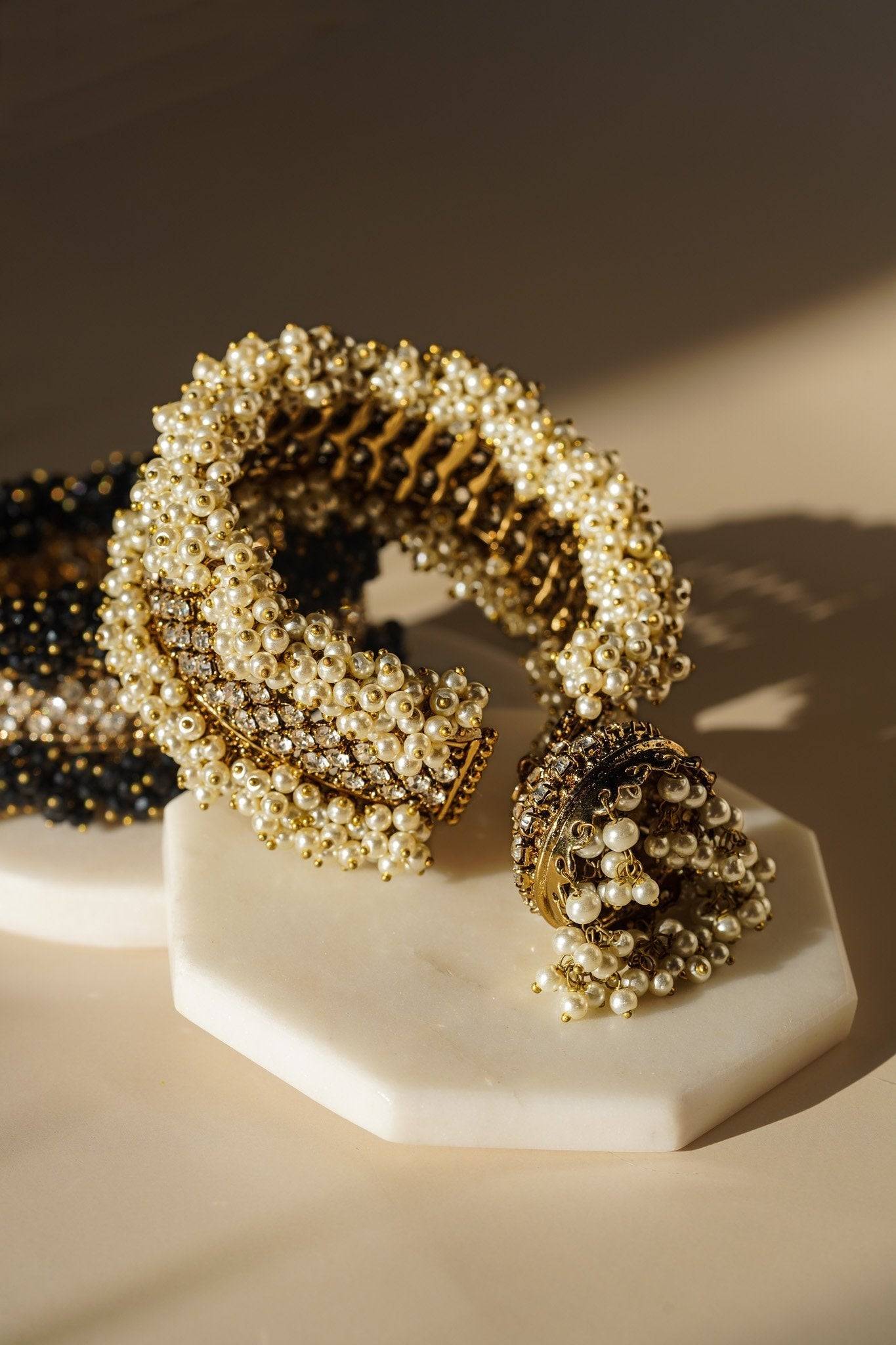 Aliya Handcrafted Bangle Bracelet - Available in silver and faux pearls, gold and faux pearls, silver and black, gold and black, gold and maroon, and silver and pink, with hanging jhumka.