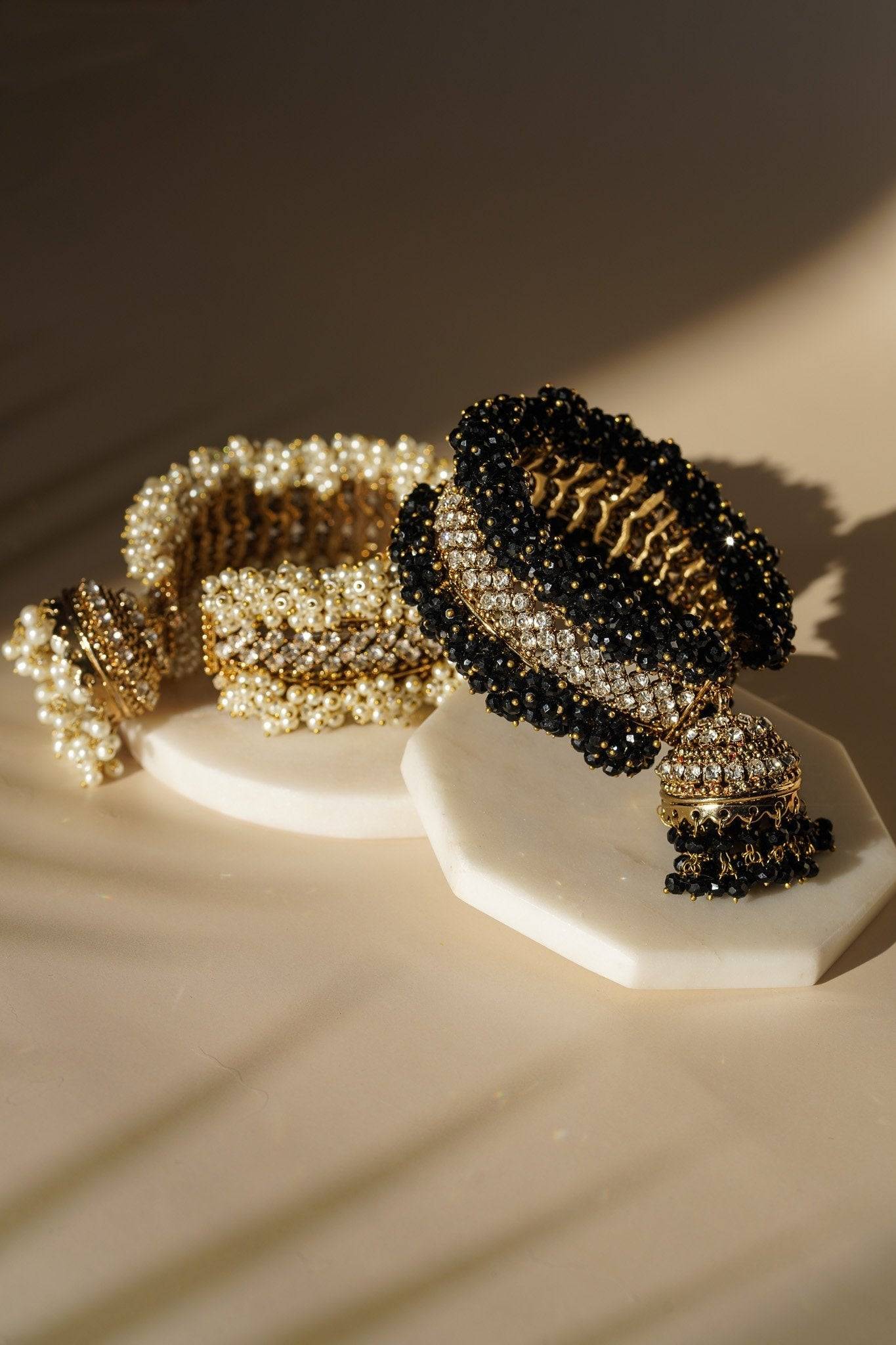 Aliya Handcrafted Bangle Bracelet - Available in silver and faux pearls, gold and faux pearls, silver and black, gold and black, gold and maroon, and silver and pink, with hanging jhumka.