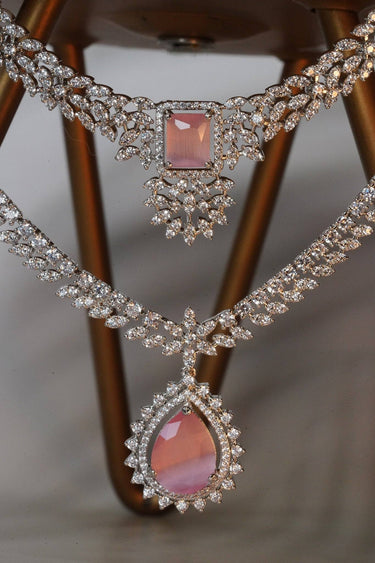 Amore Double Layer AD Necklace Set - Rhodium-plated with sparkling AD stones, available in sapphire blue or pink, featuring matching earrings and a double-layered design.