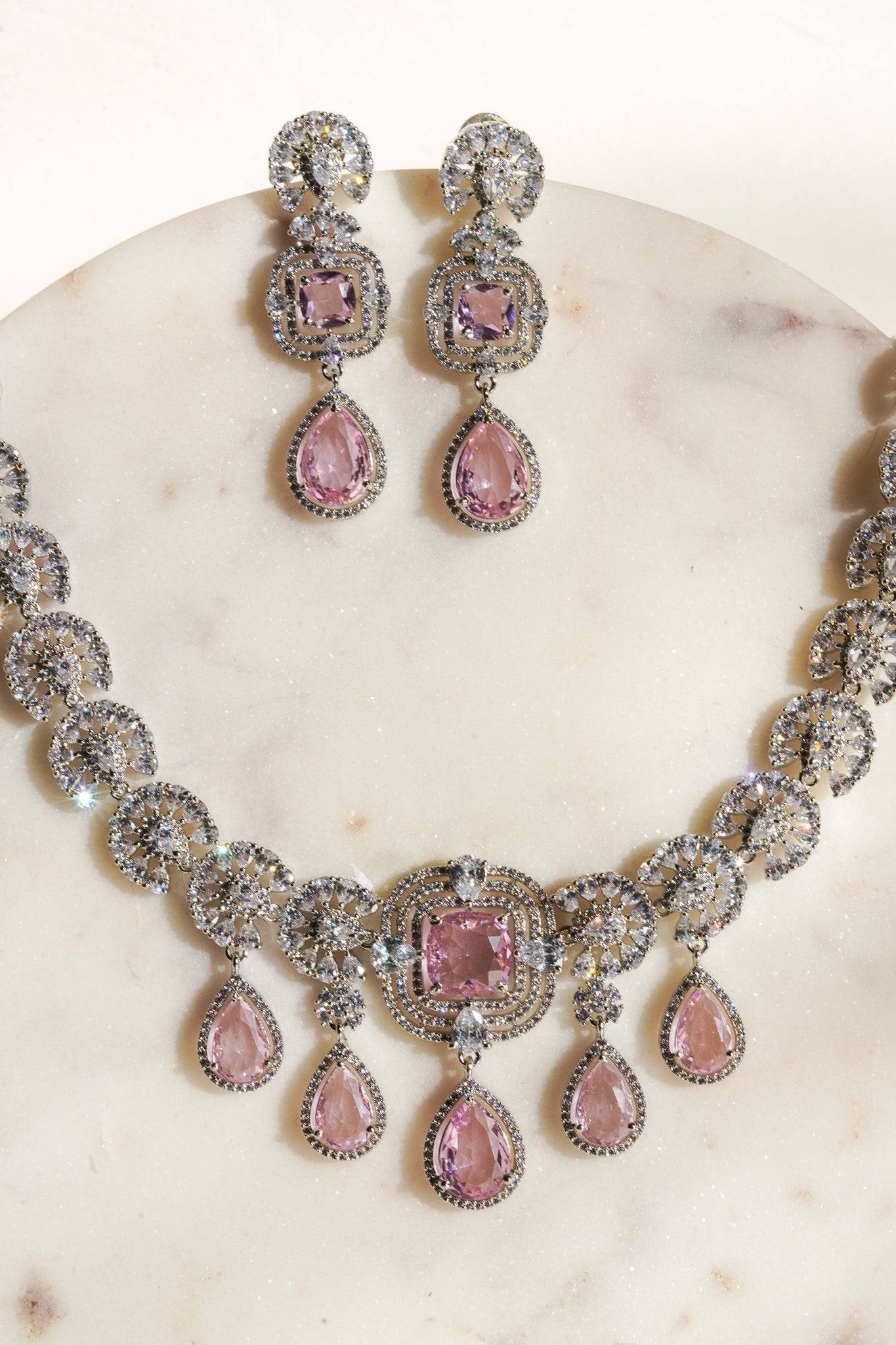Aneesha Diamante Accent AD Necklace Set - Rhodium-finished with emerald green, maroon, or dusty pink accents, featuring a statement necklace and matching earrings.
