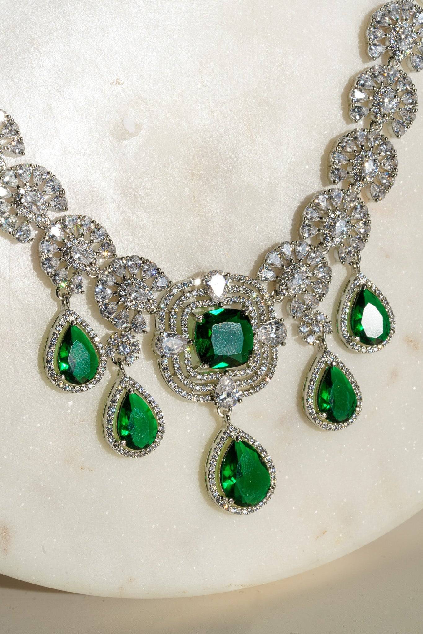 Aneesha Diamante Accent AD Necklace Set - Rhodium-finished with emerald green, maroon, or dusty pink accents, featuring a statement necklace and matching earrings.