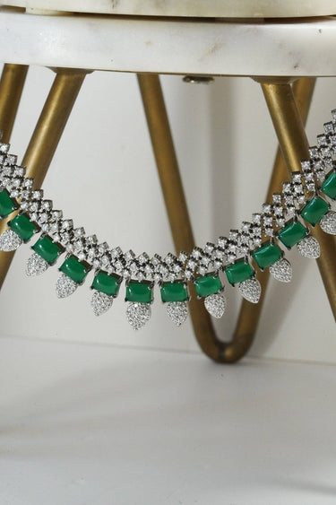 Detailed view of green Anjam Black Plated AD Necklace, showcasing the brilliance of its AD stones and elegant craftsmanship.