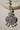 Rhodium-plated floral maang tikka with AD stones in a silver and white from Inaury