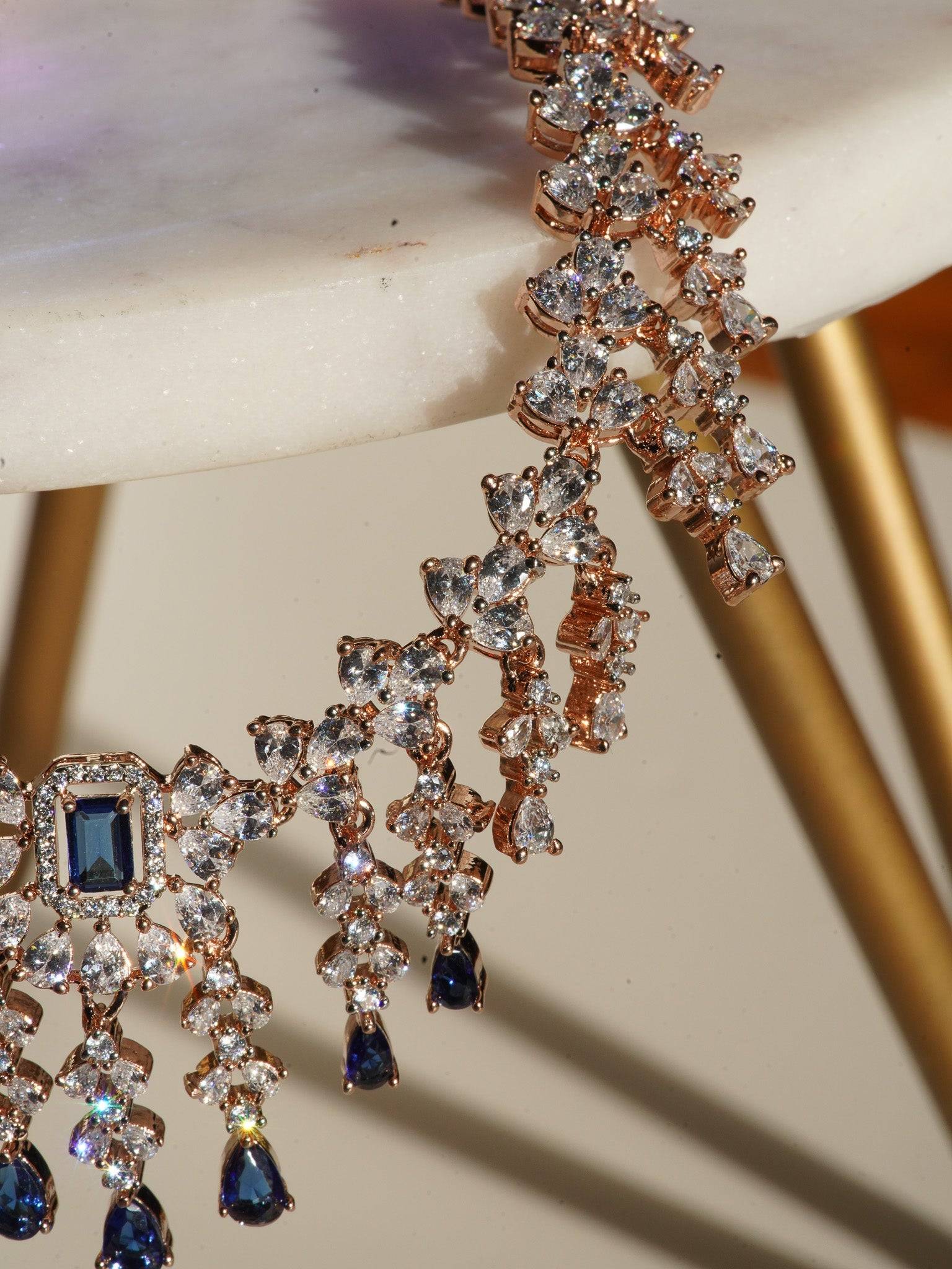 Anne Diamante Accent AD Necklace Set - Rose gold plated with cascading design, featuring diamante accent AD stones and matching dainty earrings, available in rose gold & white, rose gold & pink, rose gold & green, rose gold & sapphire blue, and rose gold & maroon.