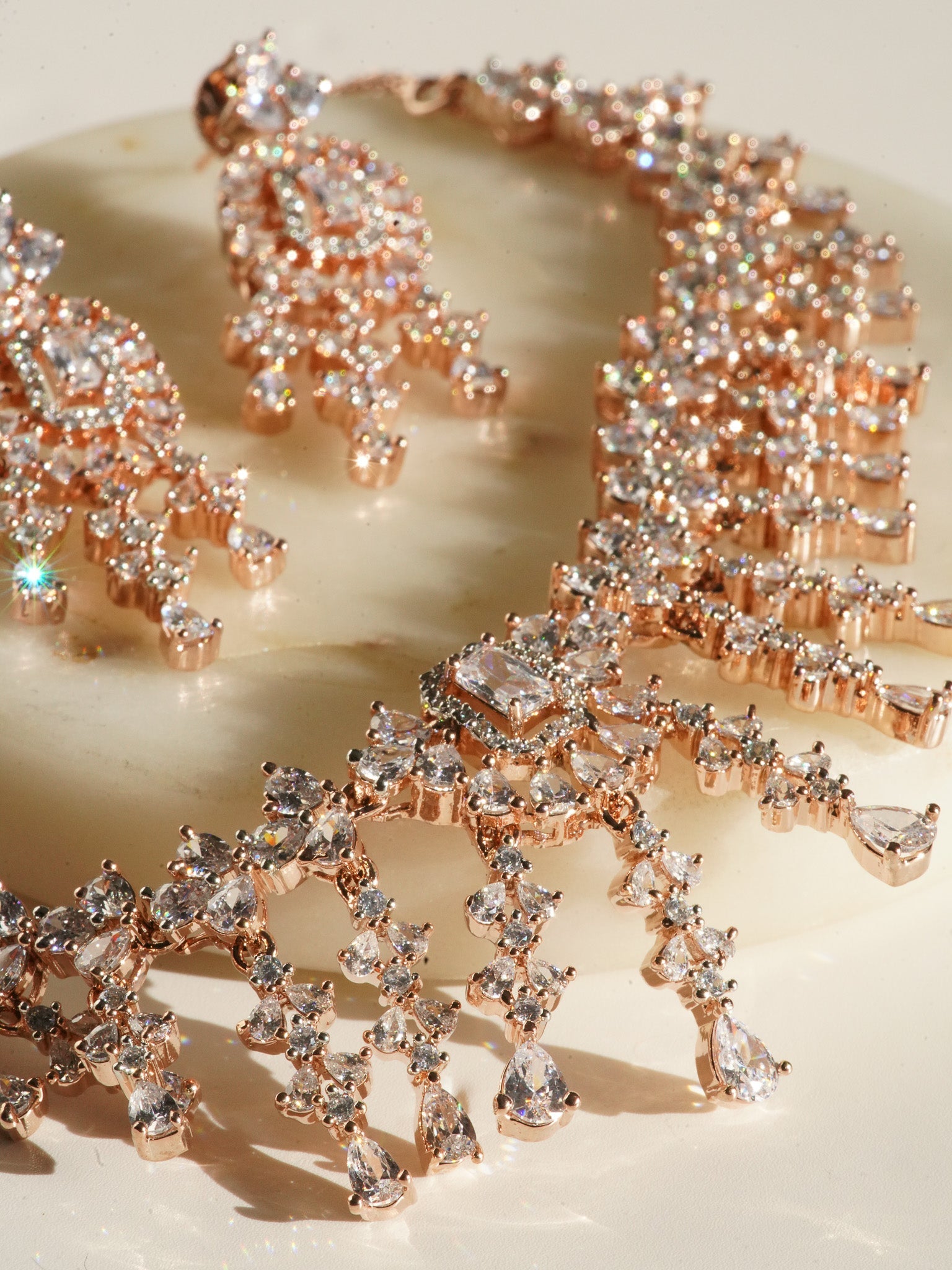 Anne Diamante Accent AD Necklace Set - Rose gold plated with cascading design, featuring diamante accent AD stones and matching dainty earrings, available in rose gold & white, rose gold & pink, rose gold & green, rose gold & sapphire blue, and rose gold & maroon.