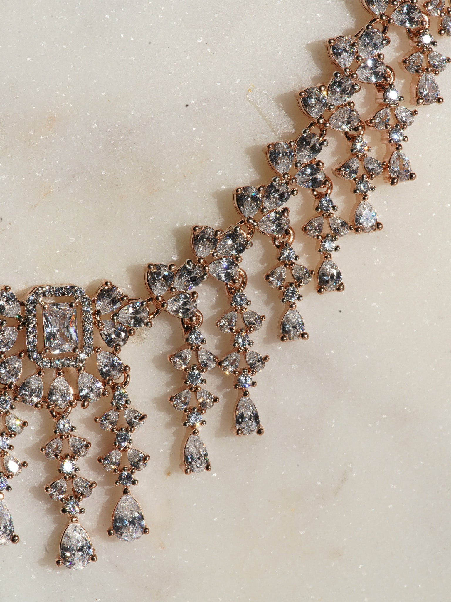 Anne Diamante Accent AD Necklace Set - Rose gold plated with cascading design, featuring diamante accent AD stones and matching dainty earrings, available in rose gold & white, rose gold & pink, rose gold & green, rose gold & sapphire blue, and rose gold & maroon.