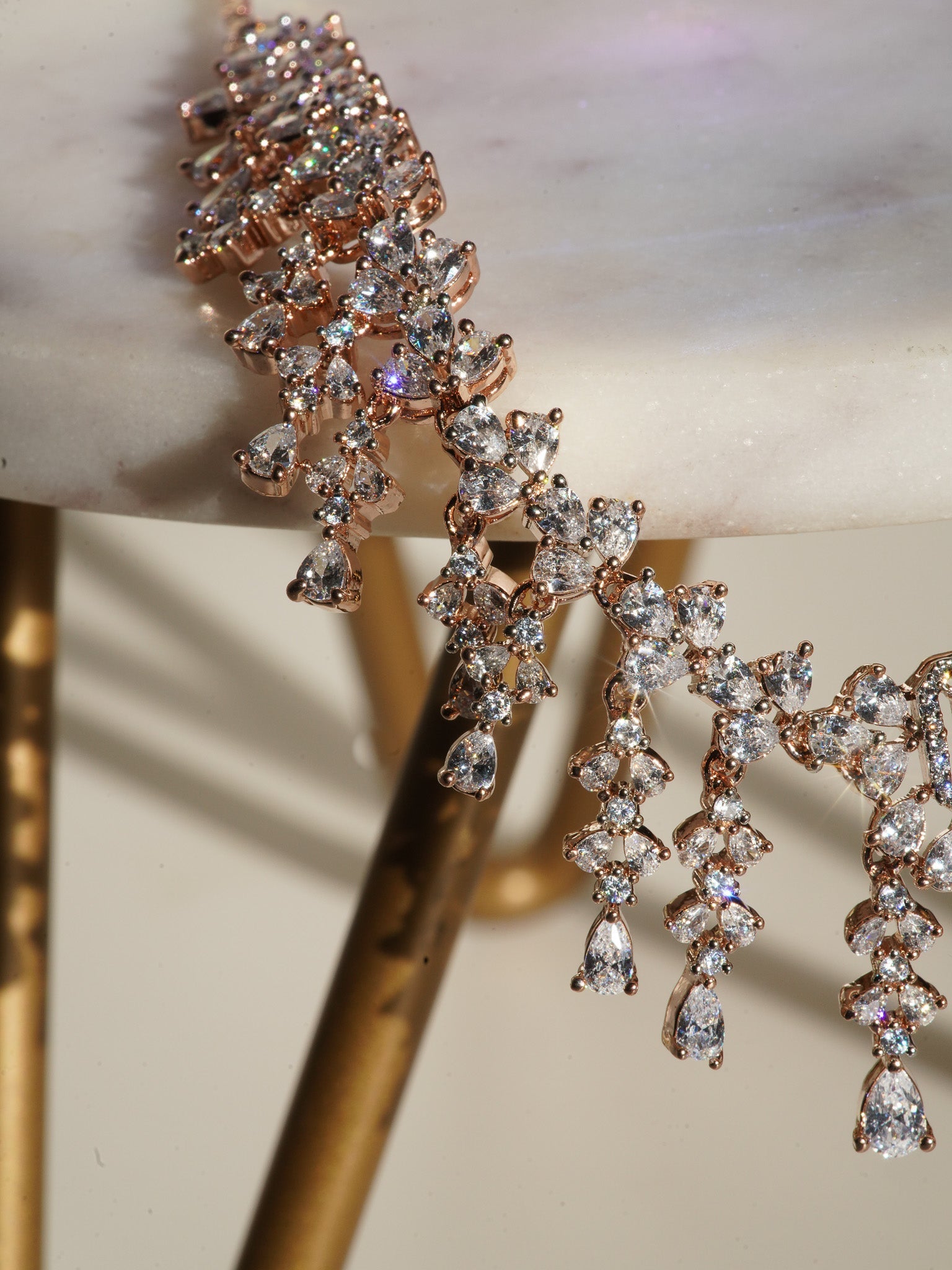 Anne Diamante Accent AD Necklace Set - Rose gold plated with cascading design, featuring diamante accent AD stones and matching dainty earrings, available in rose gold & white, rose gold & pink, rose gold & green, rose gold & sapphire blue, and rose gold & maroon.