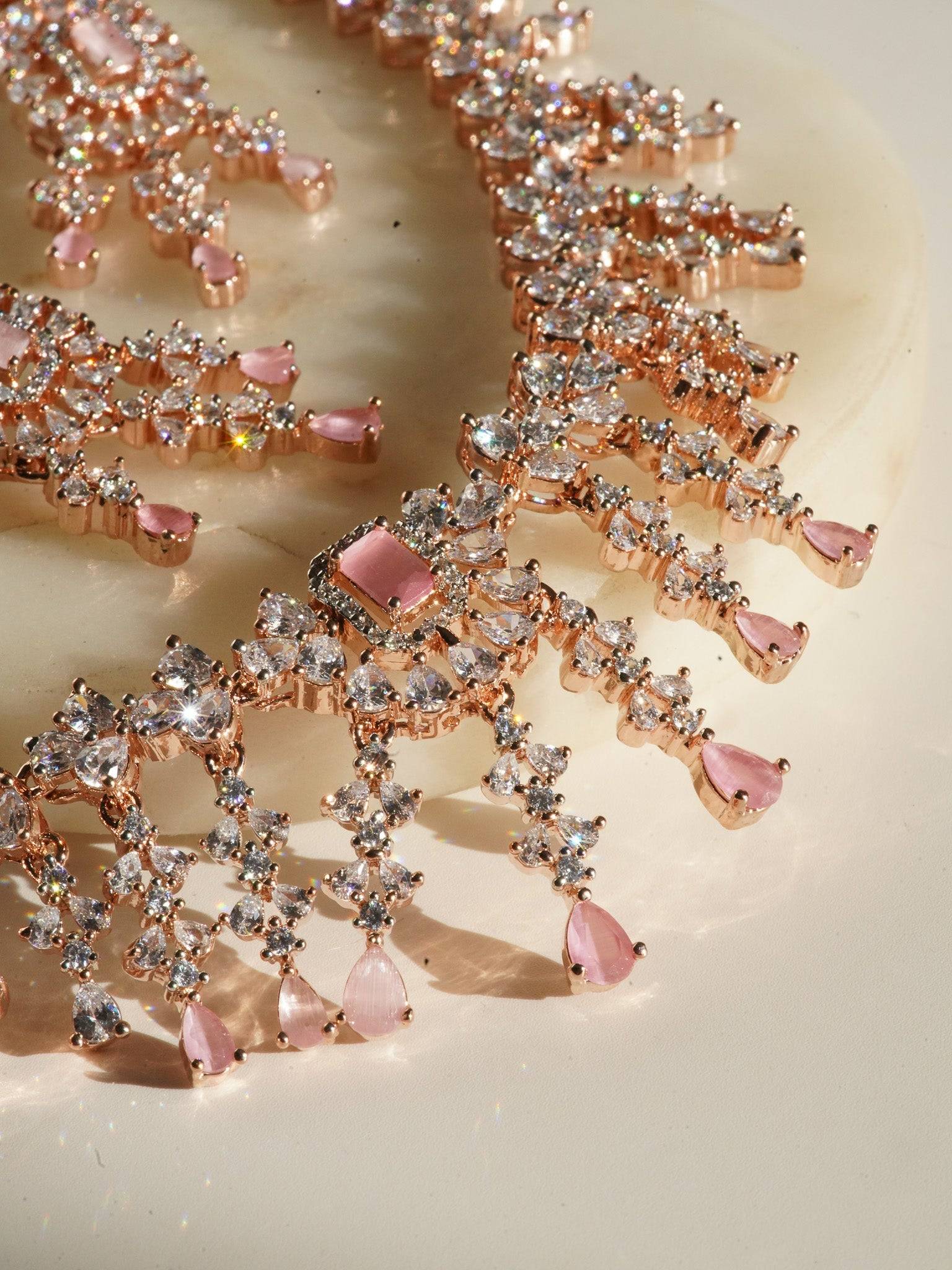 Anne Diamante Accent AD Necklace Set - Rose gold plated with cascading design, featuring diamante accent AD stones and matching dainty earrings, available in rose gold & white, rose gold & pink, rose gold & green, rose gold & sapphire blue, and rose gold & maroon.