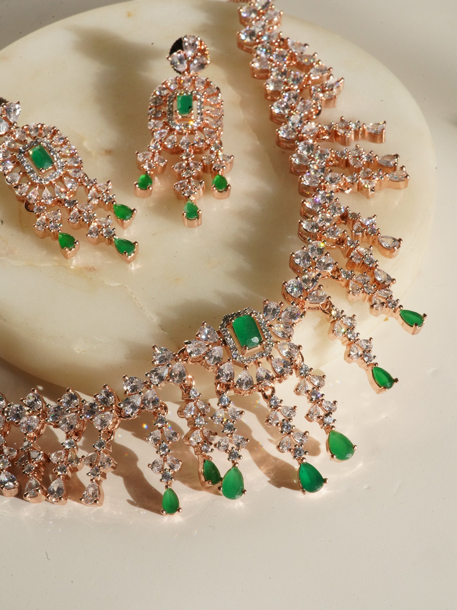 Anne Diamante Accent AD Necklace Set - Rose gold plated with cascading design, featuring diamante accent AD stones and matching dainty earrings, available in rose gold & white, rose gold & pink, rose gold & green, rose gold & sapphire blue, and rose gold & maroon.