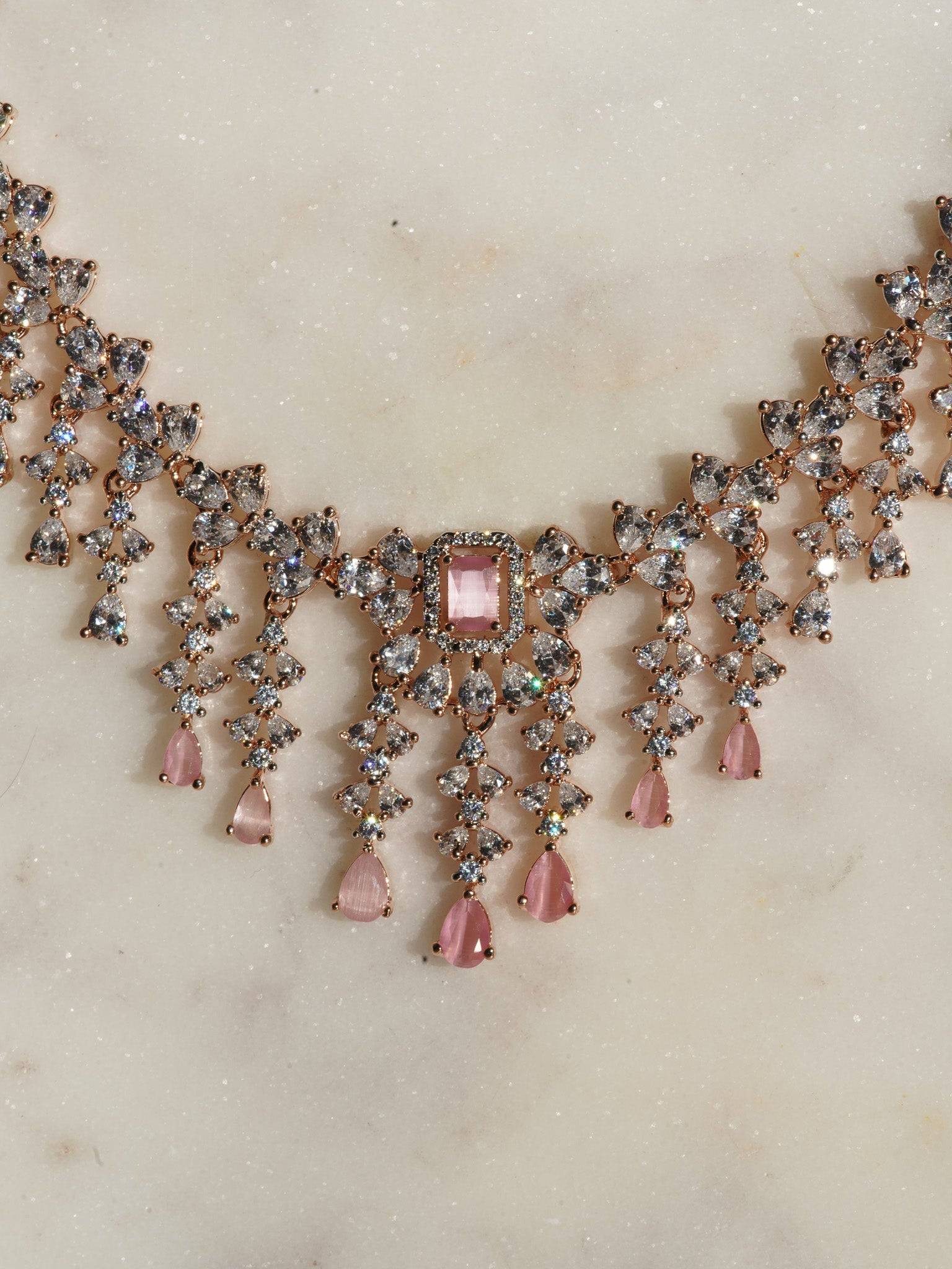 Anne Diamante Accent AD Necklace Set - Rose gold plated with cascading design, featuring diamante accent AD stones and matching dainty earrings, available in rose gold & white, rose gold & pink, rose gold & green, rose gold & sapphire blue, and rose gold & maroon.