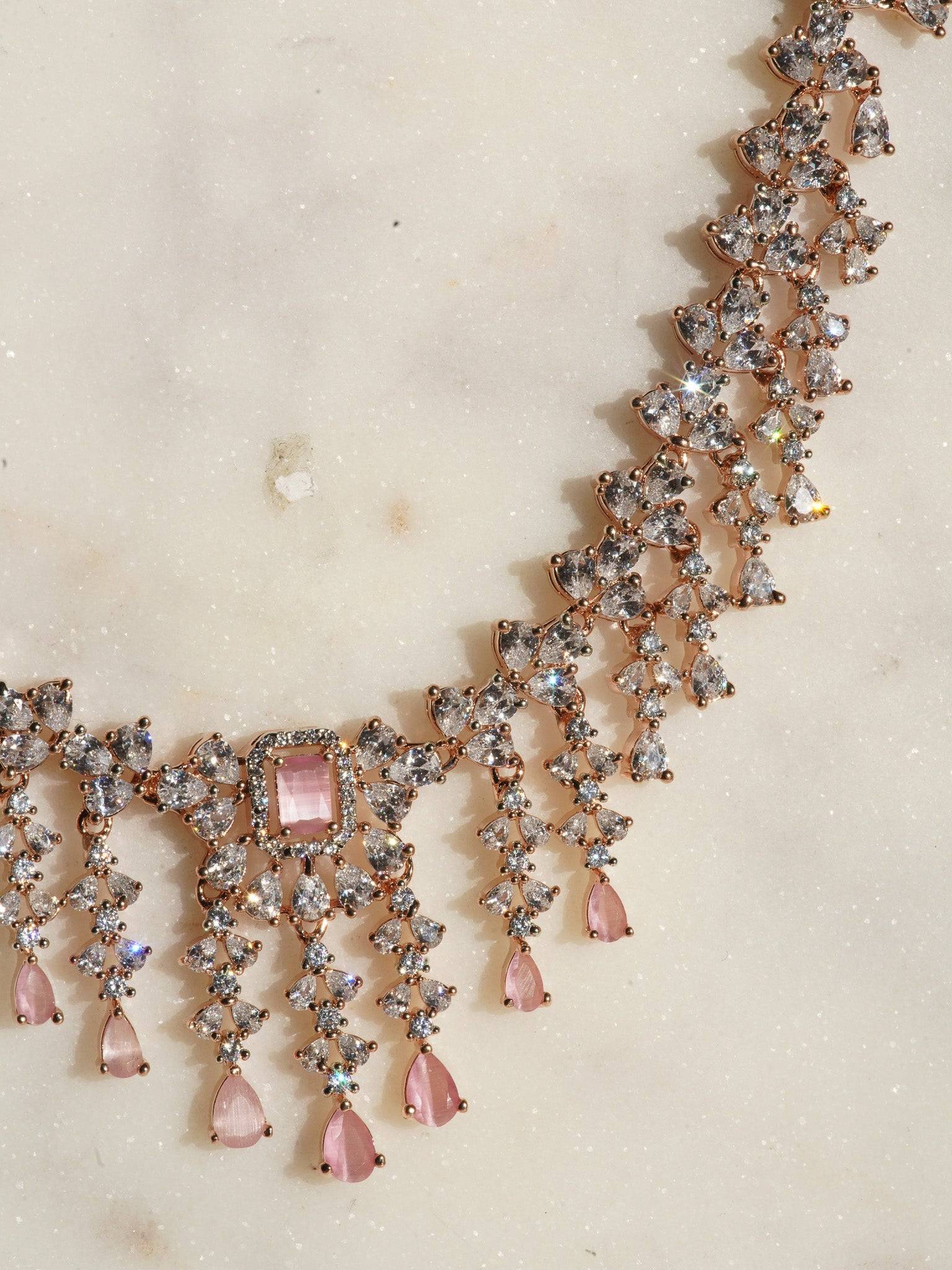 Anne Diamante Accent AD Necklace Set - Rose gold plated with cascading design, featuring diamante accent AD stones and matching dainty earrings, available in rose gold & white, rose gold & pink, rose gold & green, rose gold & sapphire blue, and rose gold & maroon.