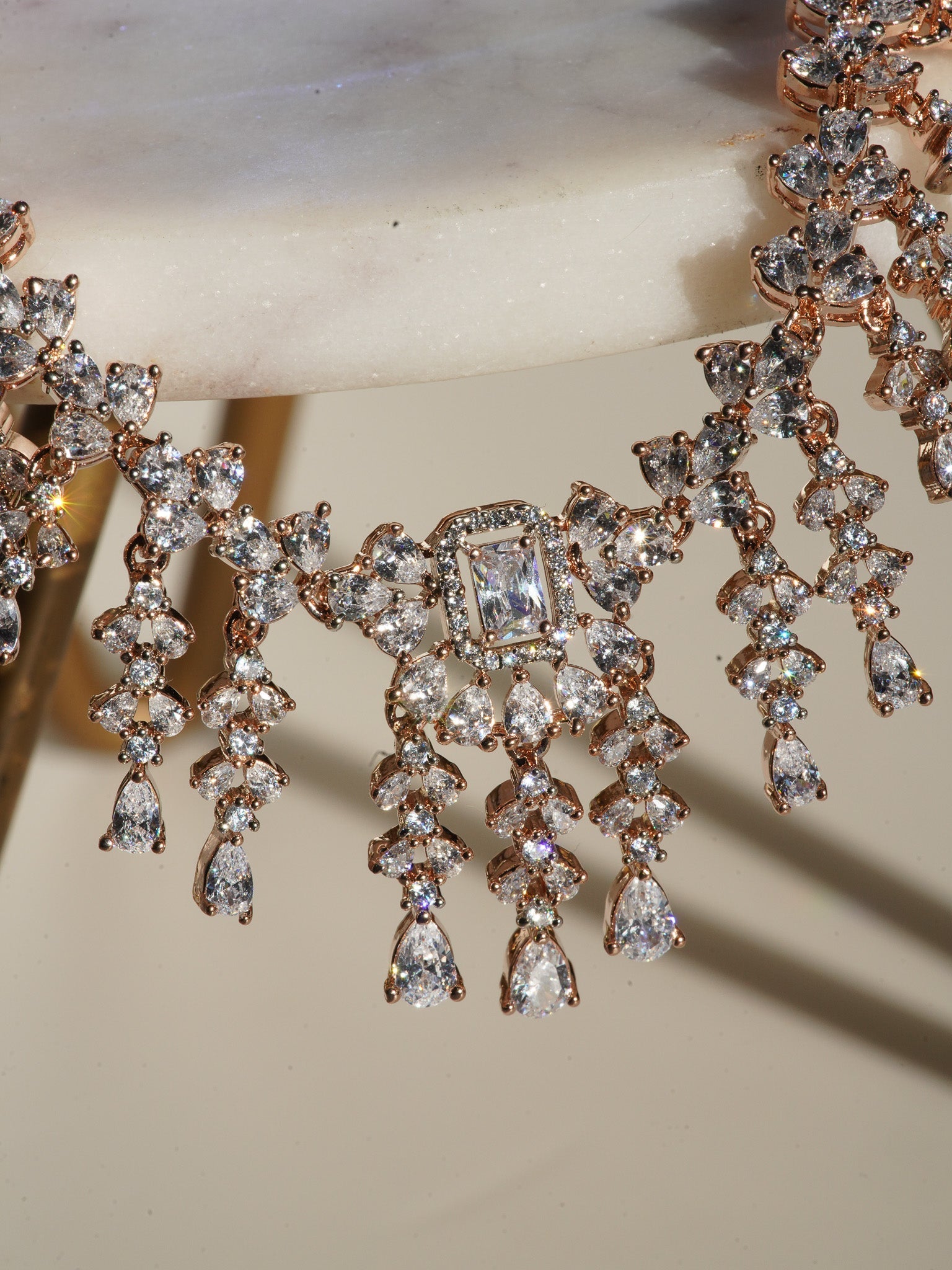 Anne Diamante Accent AD Necklace Set - Rose gold plated with cascading design, featuring diamante accent AD stones and matching dainty earrings, available in rose gold & white, rose gold & pink, rose gold & green, rose gold & sapphire blue, and rose gold & maroon.