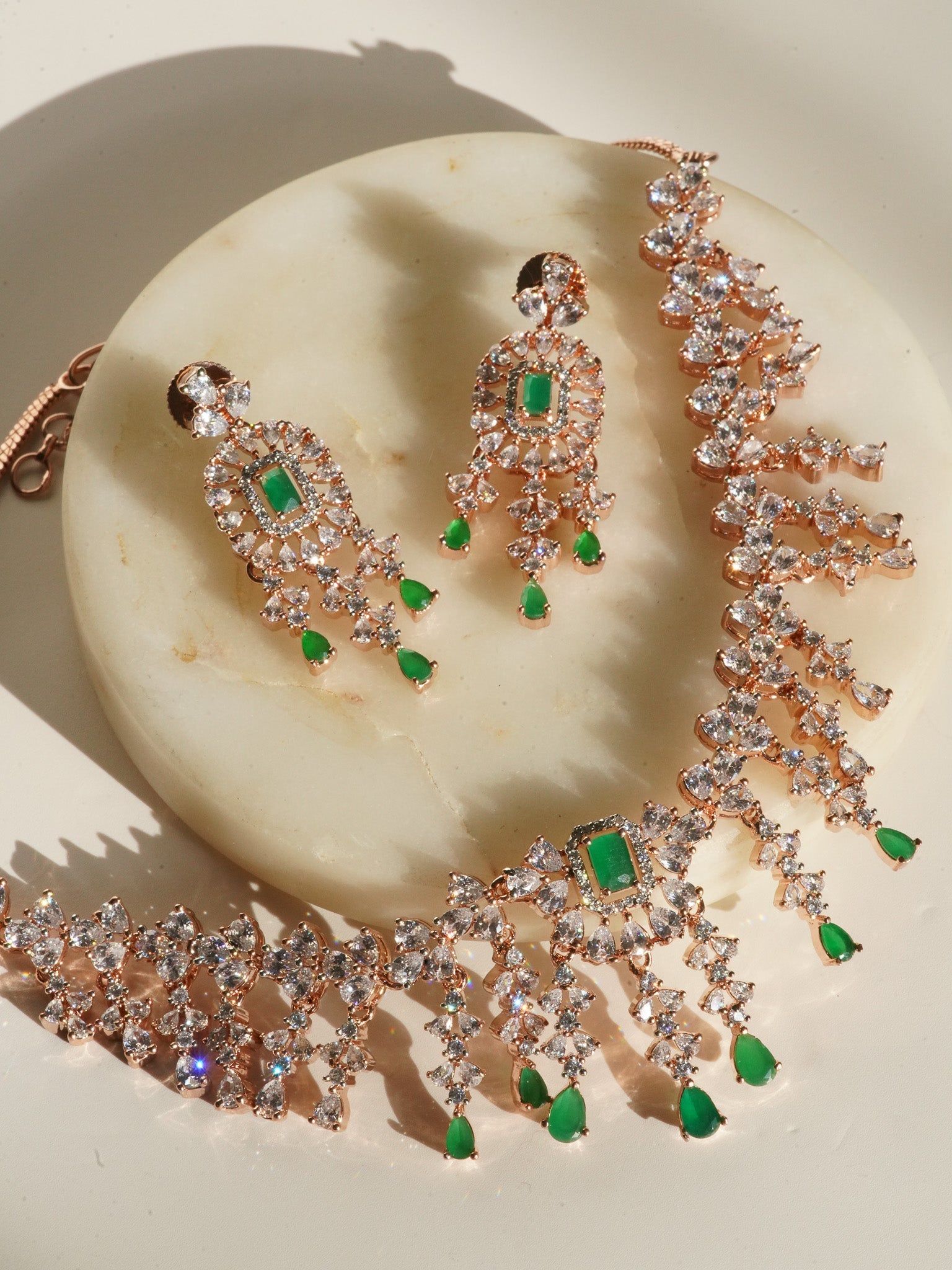 Anne Diamante Accent AD Necklace Set - Rose gold plated with cascading design, featuring diamante accent AD stones and matching dainty earrings, available in rose gold & white, rose gold & pink, rose gold & green, rose gold & sapphire blue, and rose gold & maroon.