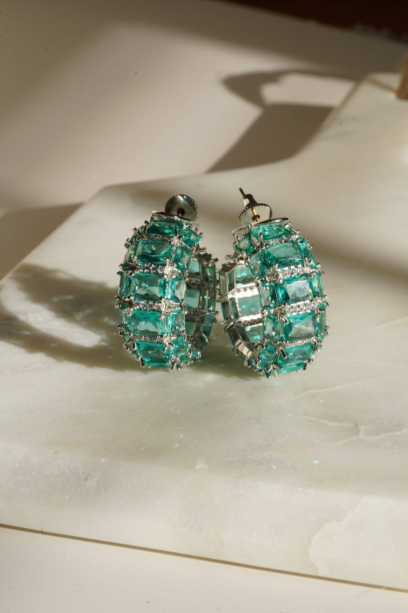 Azure Chunky AD Huggie Hoops - Rhodium-plated with Diamante accents, available in silver, yellow, teal, aqua, and light pink, featuring extra support backing.