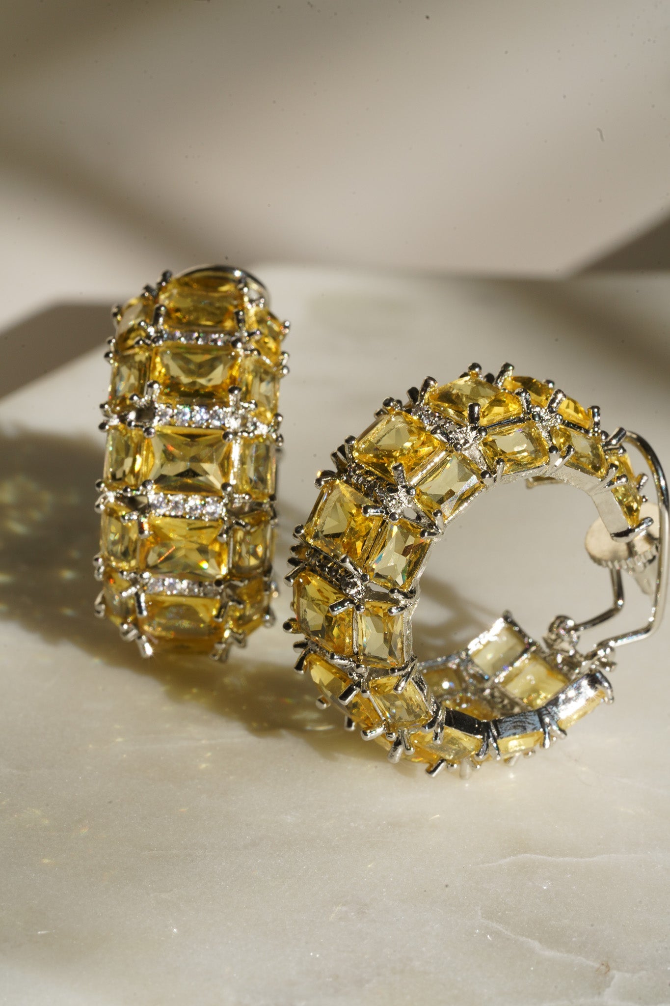 Azure Chunky AD Huggie Hoops - Rhodium-plated with Diamante accents, available in silver, yellow, teal, aqua, and light pink, featuring extra support backing.