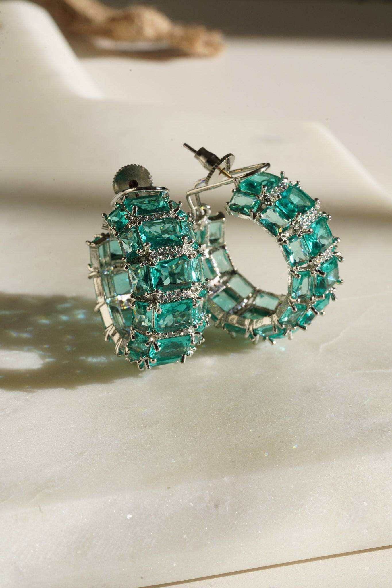 Azure Chunky AD Huggie Hoops - Rhodium-plated with Diamante accents, available in silver, yellow, teal, aqua, and light pink, featuring extra support backing.
