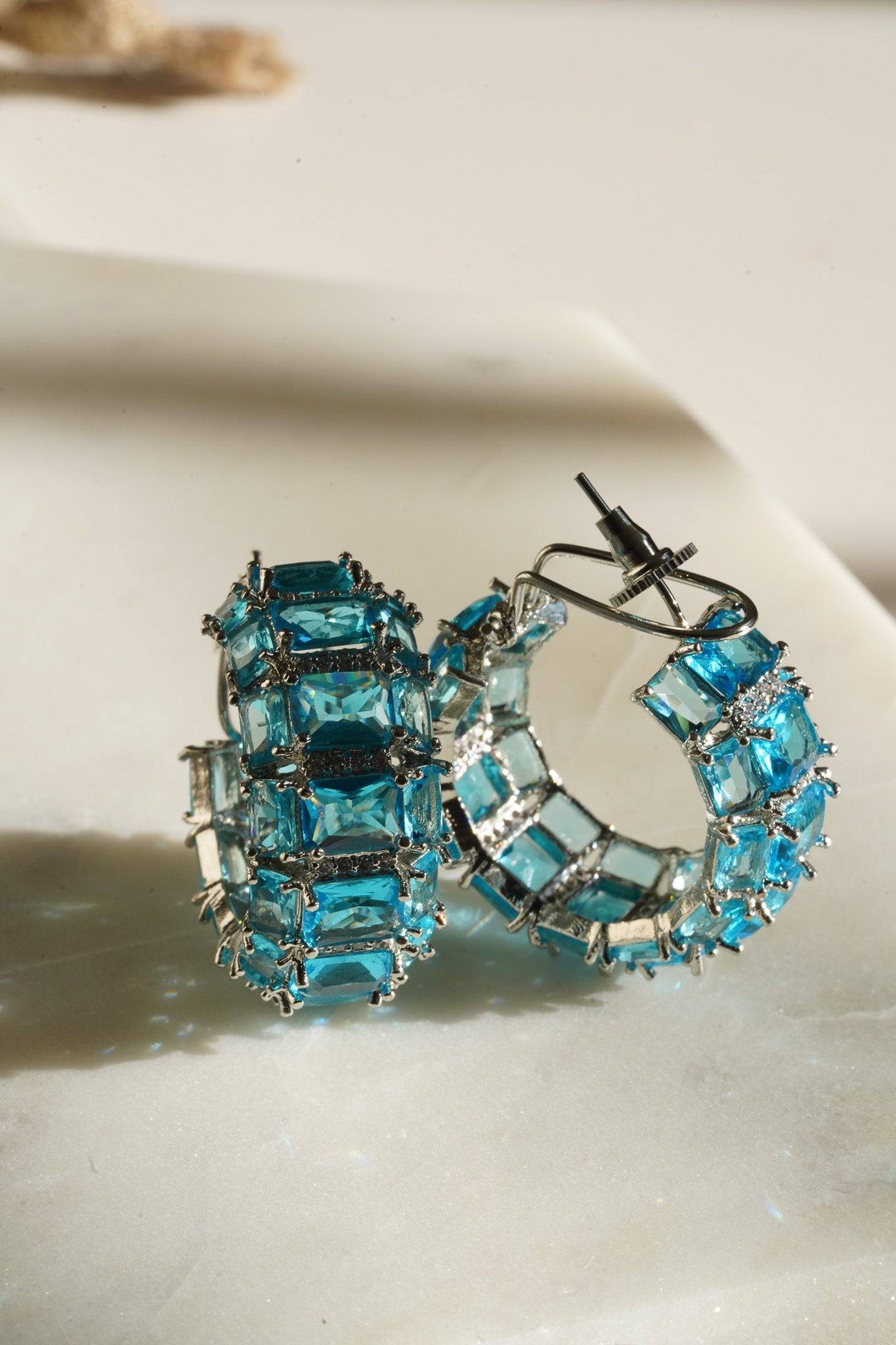Azure Chunky AD Huggie Hoops - Rhodium-plated with Diamante accents, available in silver, yellow, teal, aqua, and light pink, featuring extra support backing.