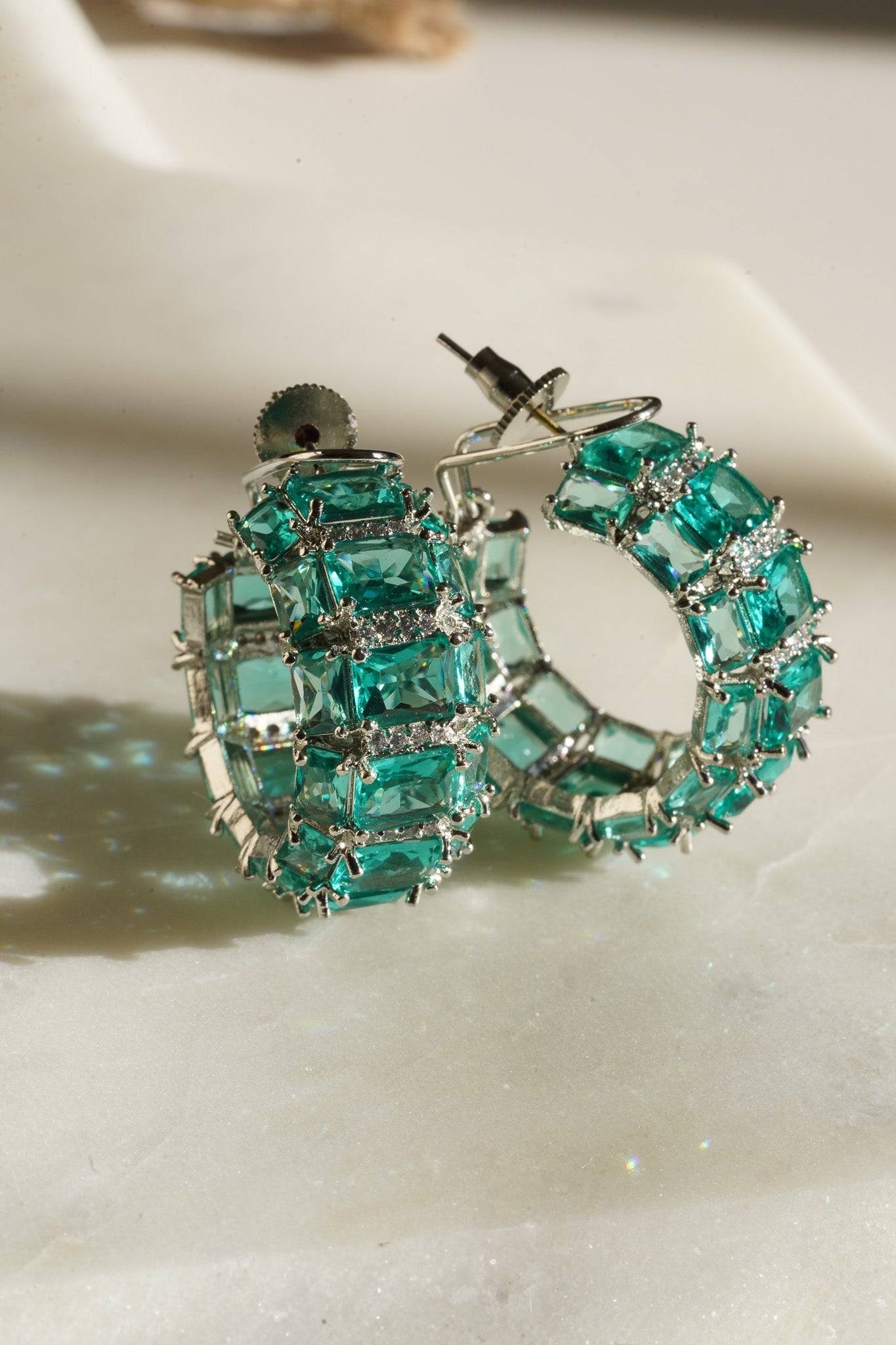 Azure Chunky AD Huggie Hoops - Rhodium-plated with Diamante accents, available in silver, yellow, teal, aqua, and light pink, featuring extra support backing.