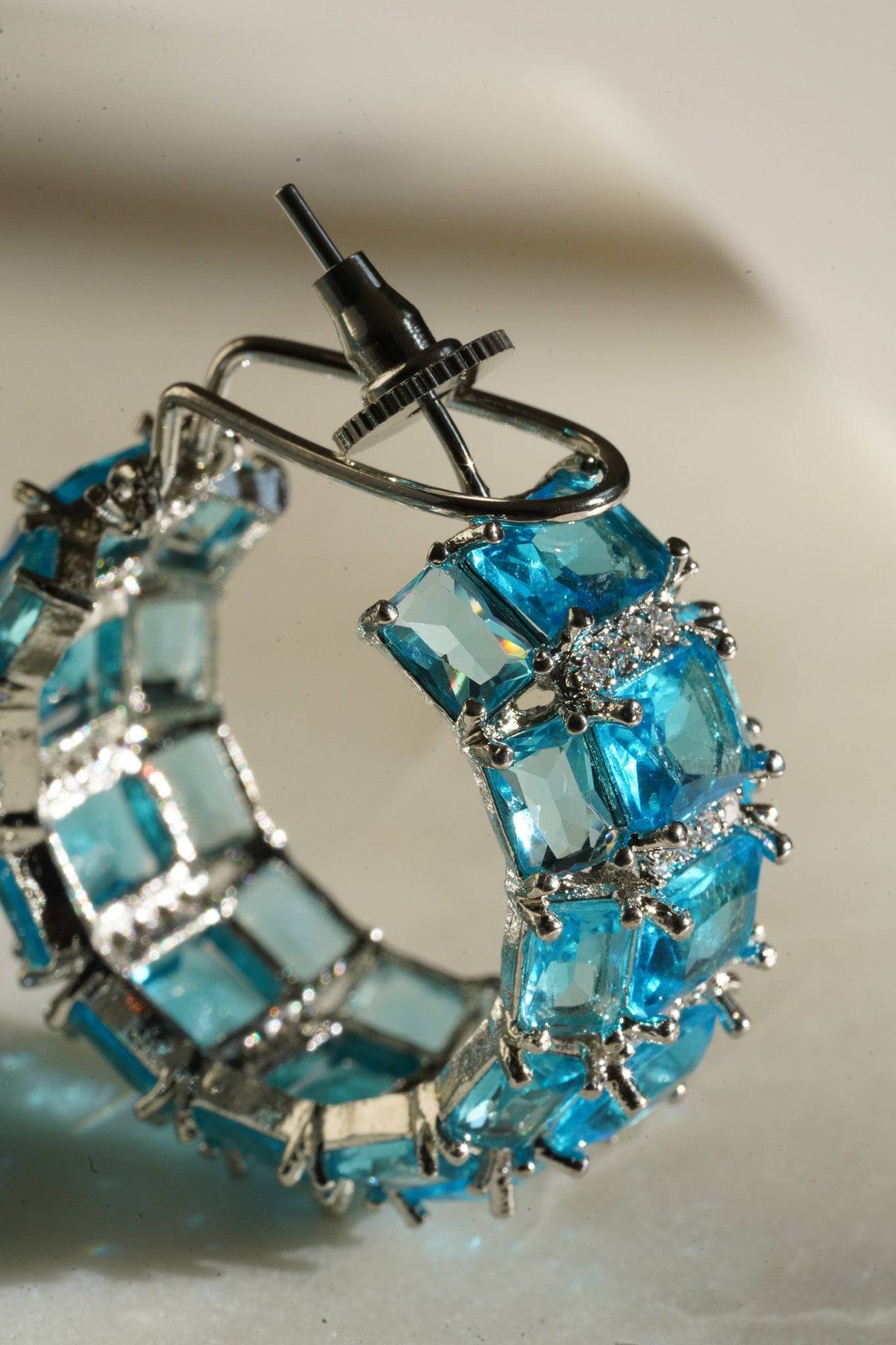 Azure Chunky AD Huggie Hoops - Rhodium-plated with Diamante accents, available in silver, yellow, teal, aqua, and light pink, featuring extra support backing.
