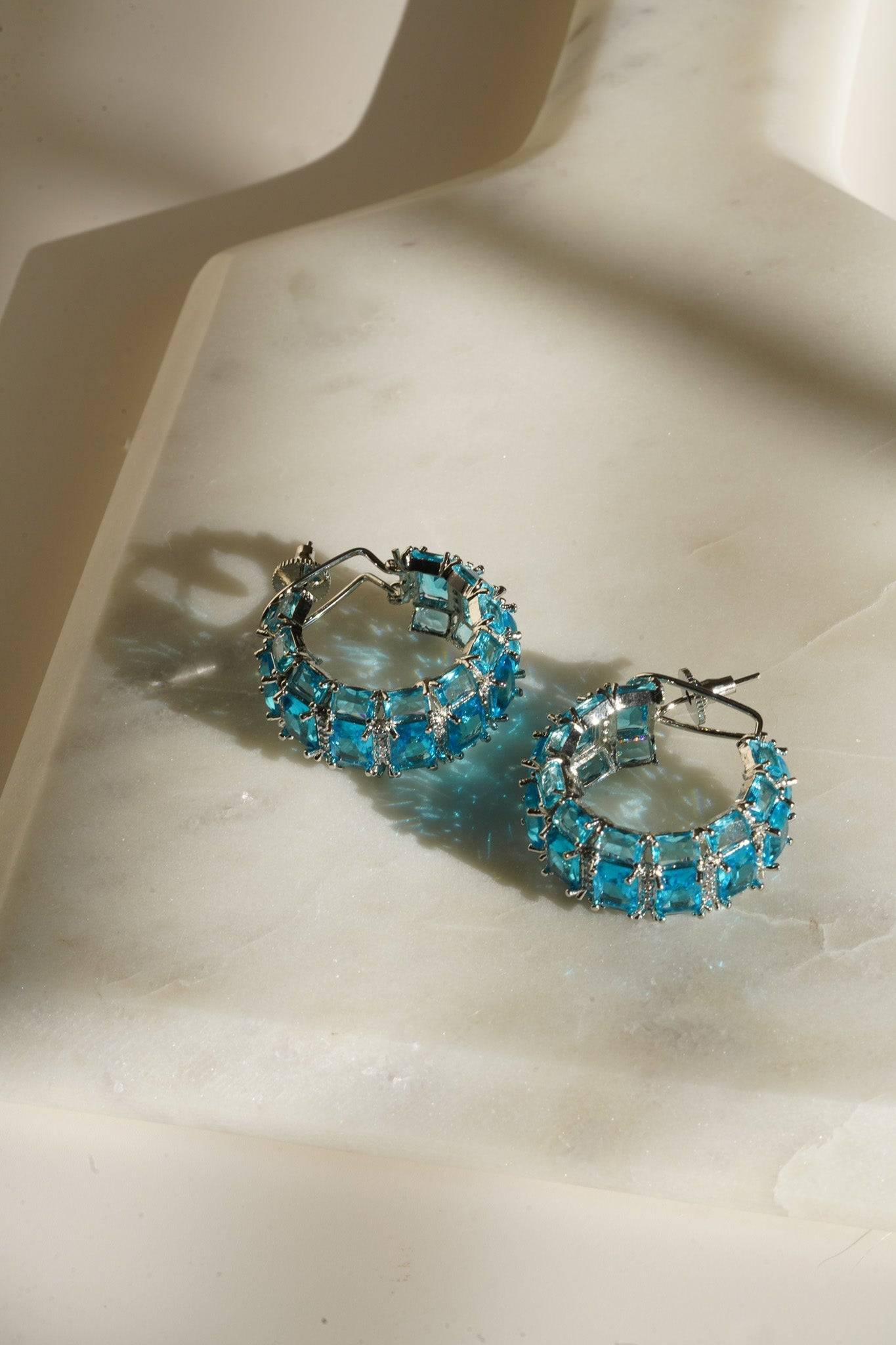 Azure Chunky AD Huggie Hoops - Rhodium-plated with Diamante accents, available in silver, yellow, teal, aqua, and light pink, featuring extra support backing.
