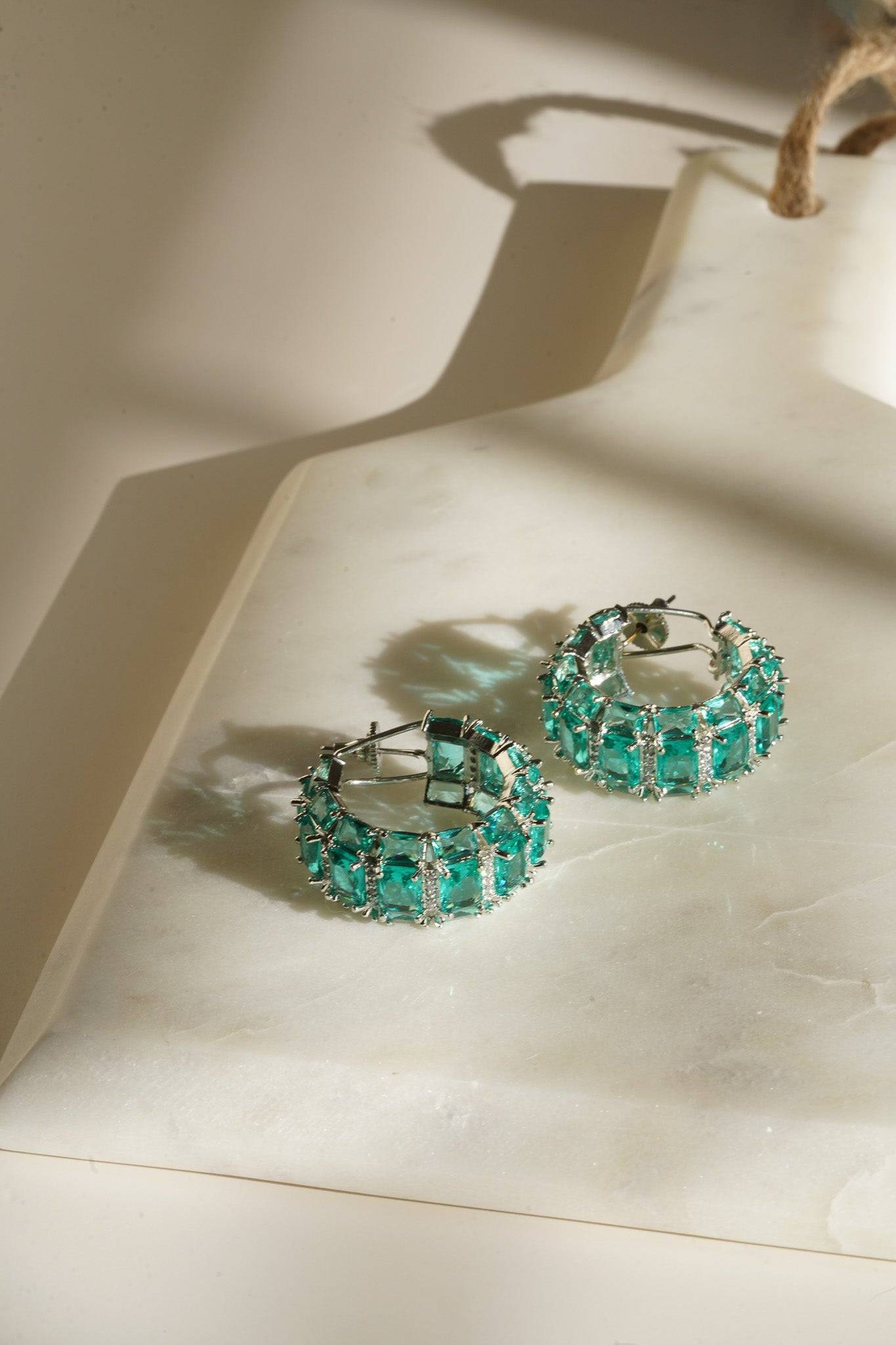 Azure Chunky AD Huggie Hoops - Rhodium-plated with Diamante accents, available in silver, yellow, teal, aqua, and light pink, featuring extra support backing.