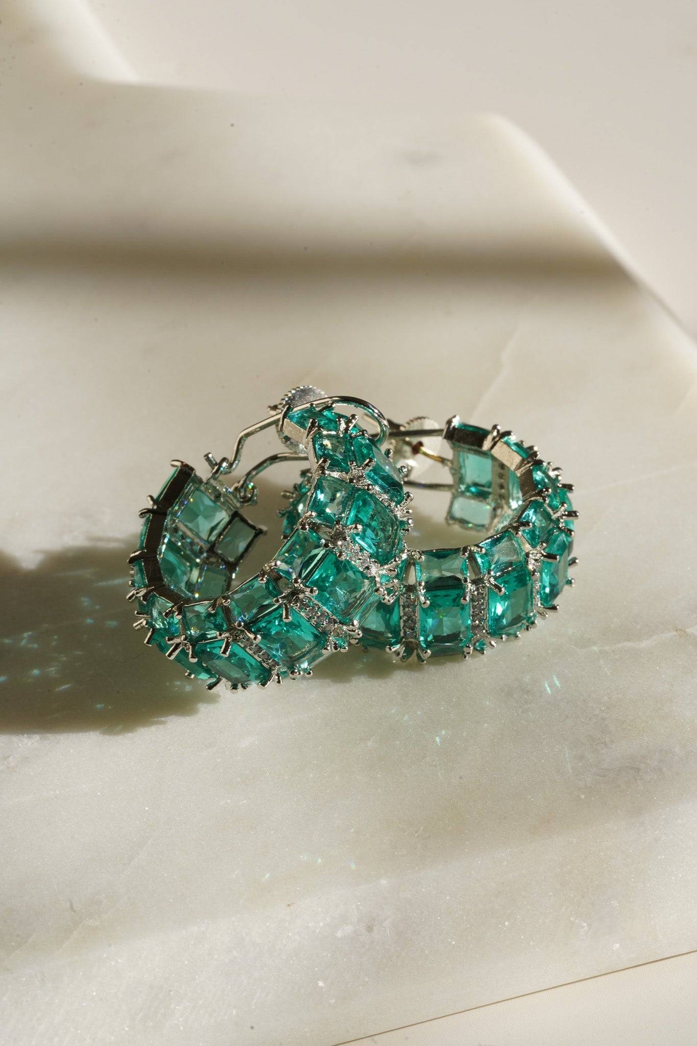 Azure Chunky AD Huggie Hoops - Rhodium-plated with Diamante accents, available in silver, yellow, teal, aqua, and light pink, featuring extra support backing.