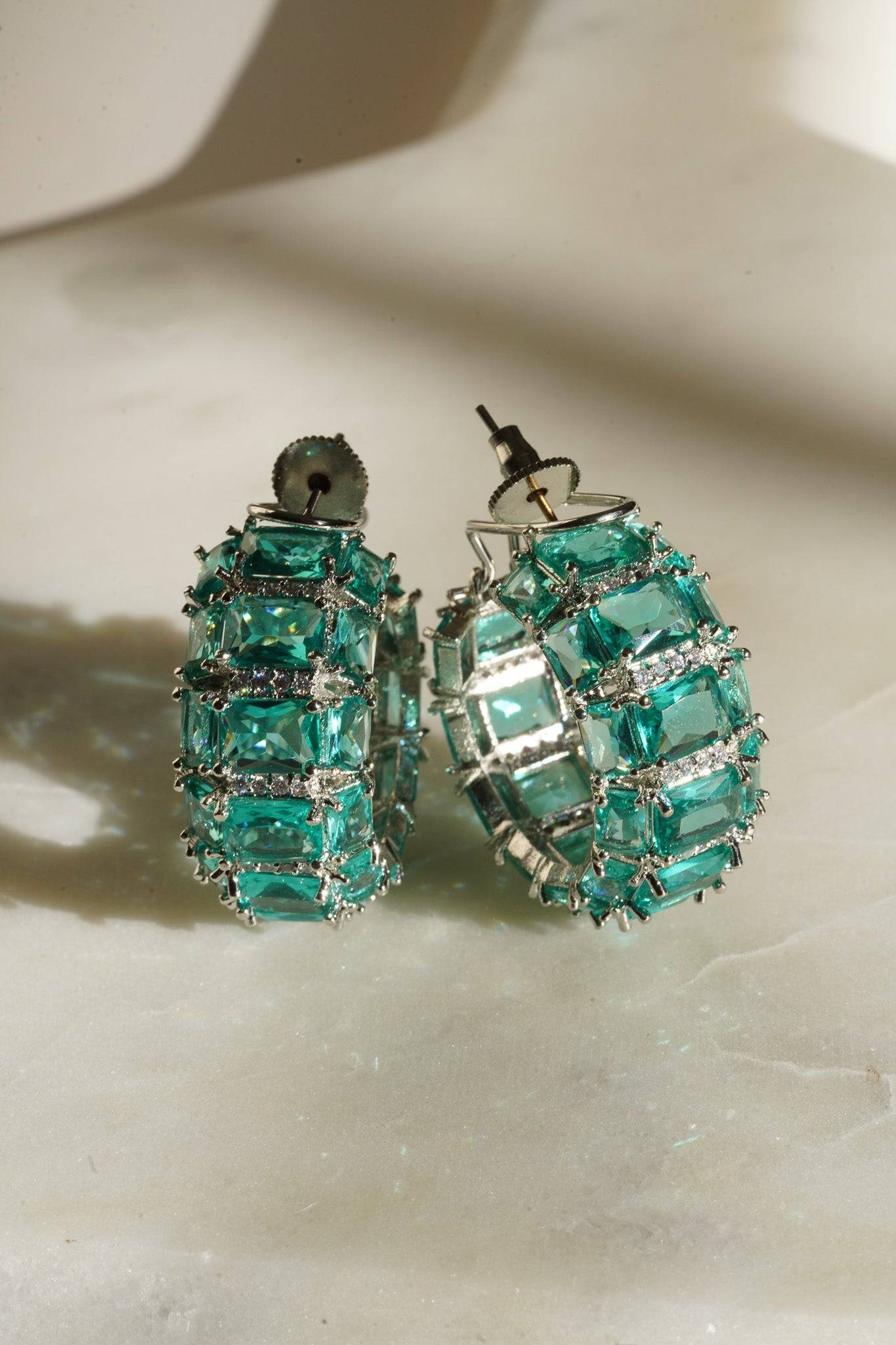 Azure Chunky AD Huggie Hoops - Rhodium-plated with Diamante accents, available in silver, yellow, teal, aqua, and light pink, featuring extra support backing.