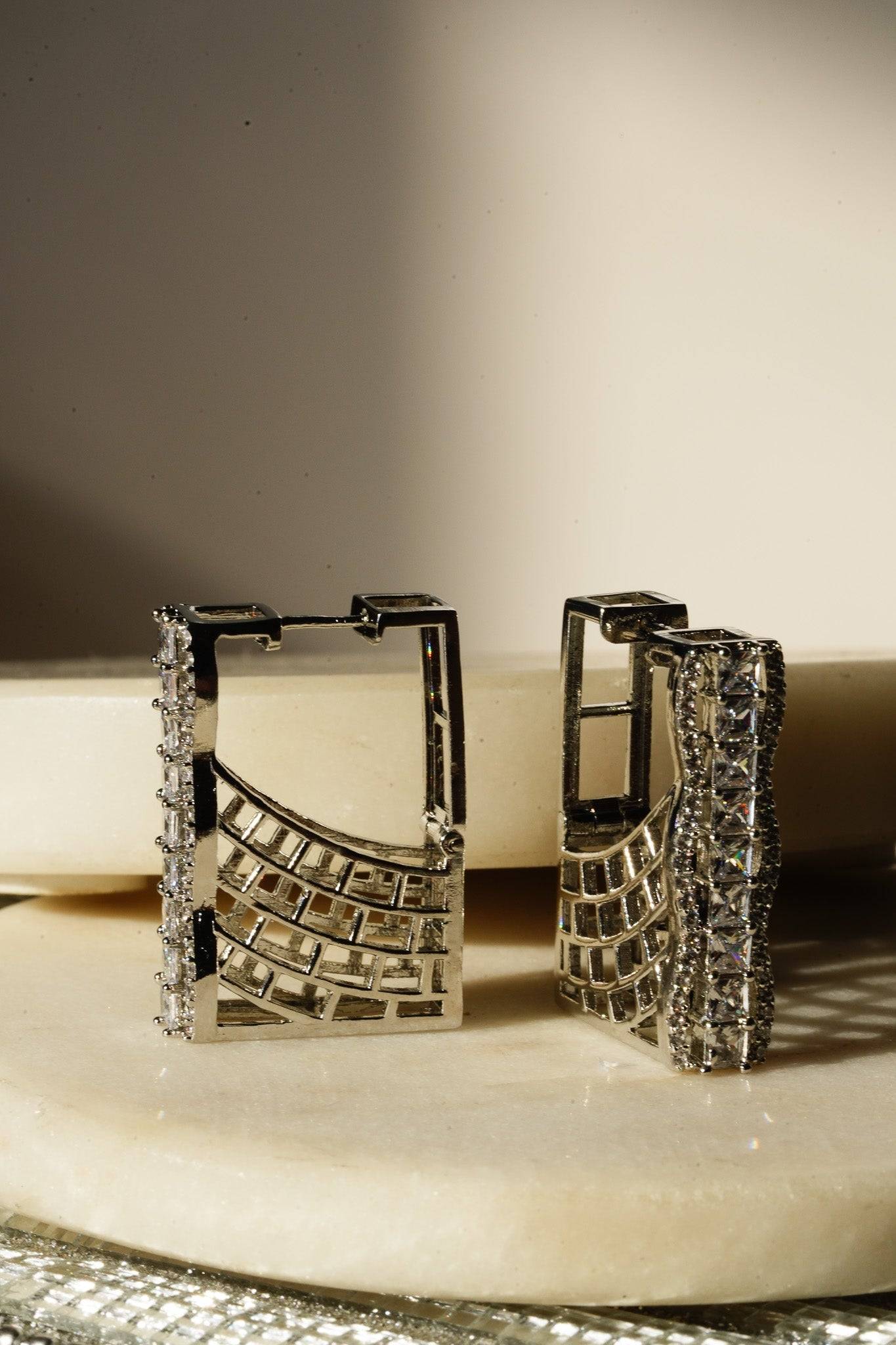 Daina - Huggie AD Hoop Earrings Huggie from Inaury