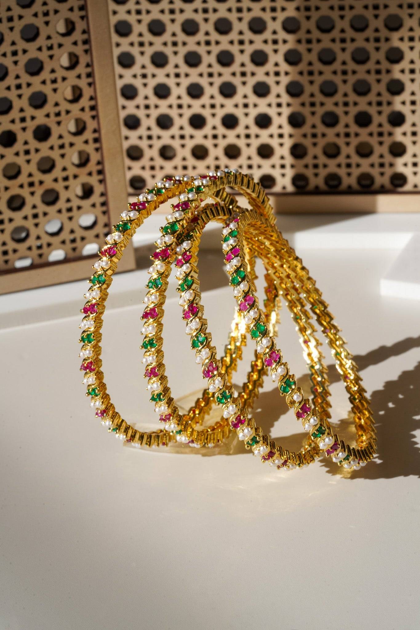 Ipsa - Multicolor AD & Pearl Bangle Set (6 PC.) Bangles from Inaury