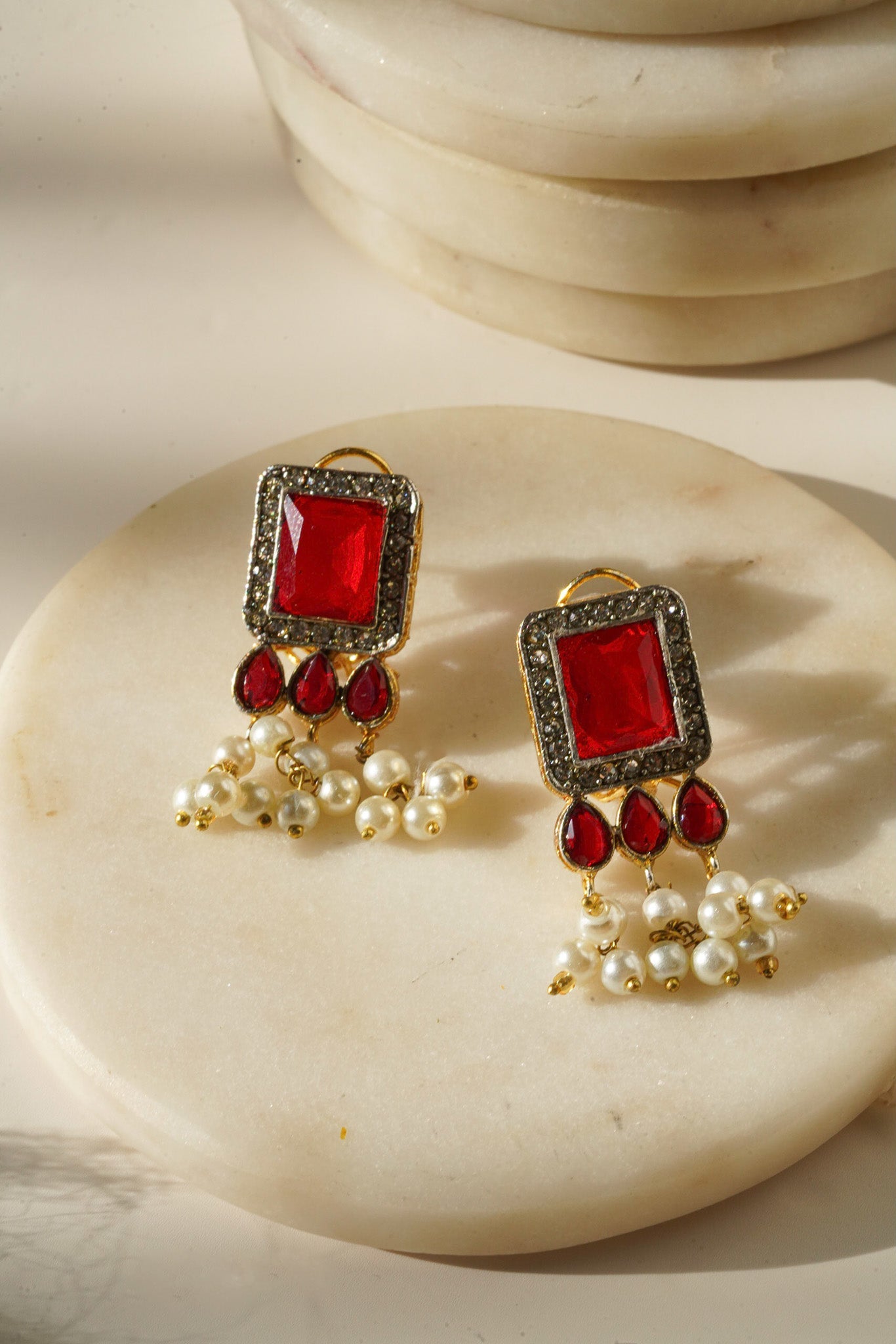 Jahanara Gold Plated Choker Necklace Set - Artisan crafted with cushion cut center stones, zircon rims, teardrop accents, 1.5" earrings, and a charming maang tikka.