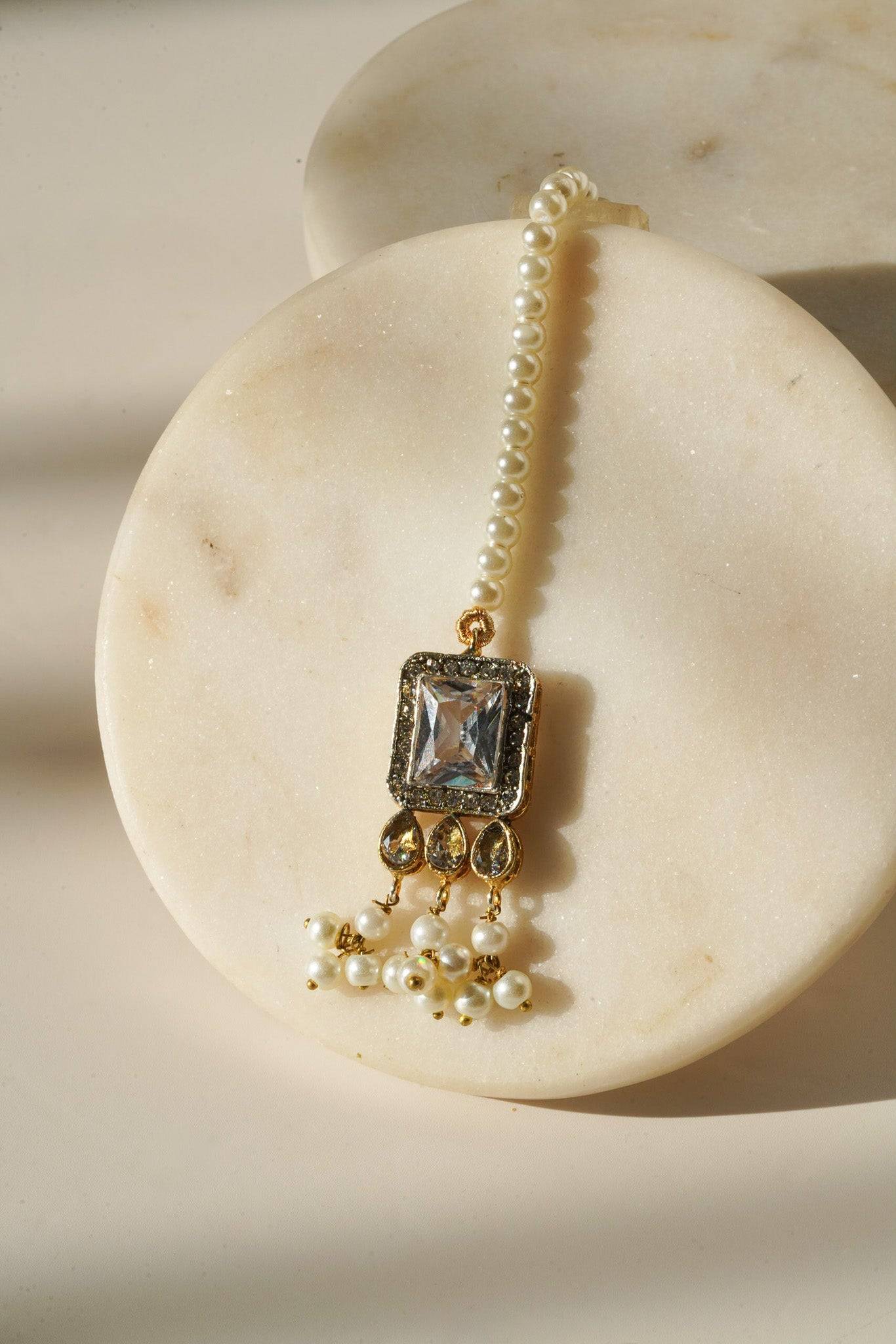 Jahanara Gold Plated Choker Necklace Set - Artisan crafted with cushion cut center stones, zircon rims, teardrop accents, 1.5" earrings, and a charming maang tikka.