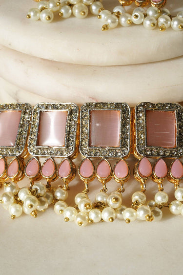 Jahanara Gold Plated Choker Necklace Set - Artisan crafted with cushion cut center stones, zircon rims, teardrop accents, 1.5" earrings, and a charming maang tikka.