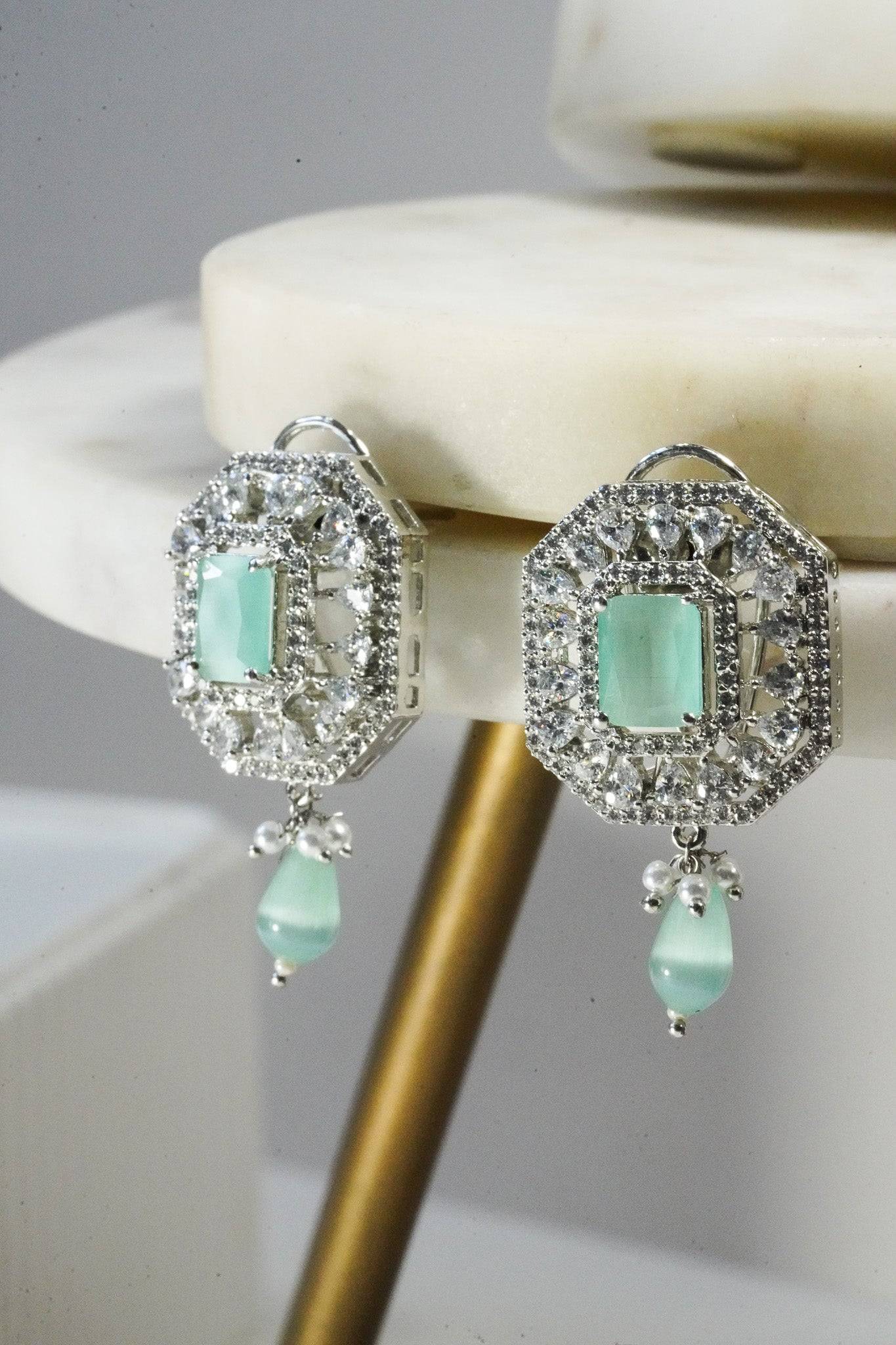 Jhanvi Choker Necklace Set - Silver & Gem Variations featuring cushion-cut AD stones with mint green teardrop accents, includes matching earrings.